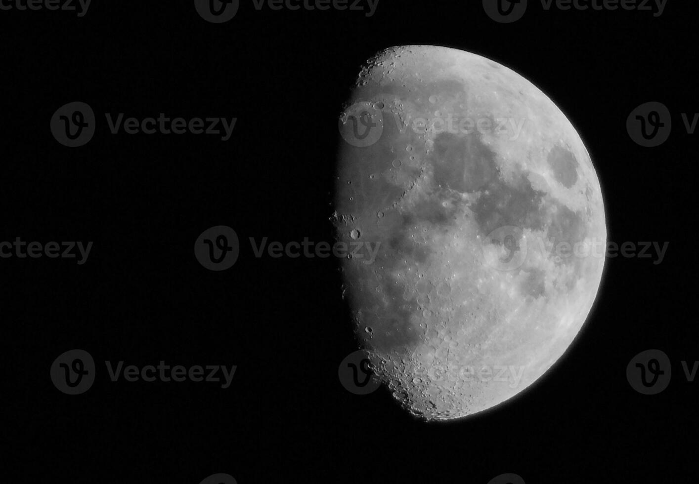 Waxing crescent half Moon. Details of of lunar surface with copy space. Concept of astronomy, astrology, mysticism or science photo