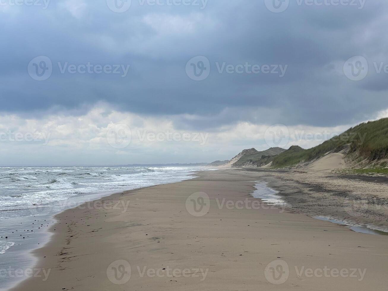 Seascape under a cloudy sky. Skagerrak, Kattegat strait in Skagen, Denmark photo