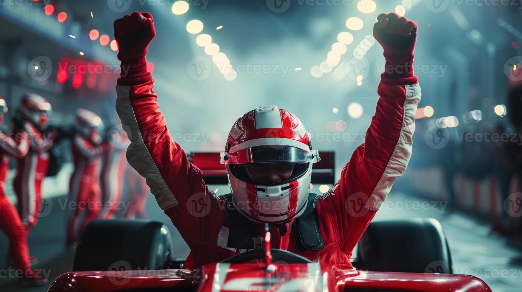 Formula 1 Driver Celebrates Victory With Raised Arms at Night Race photo