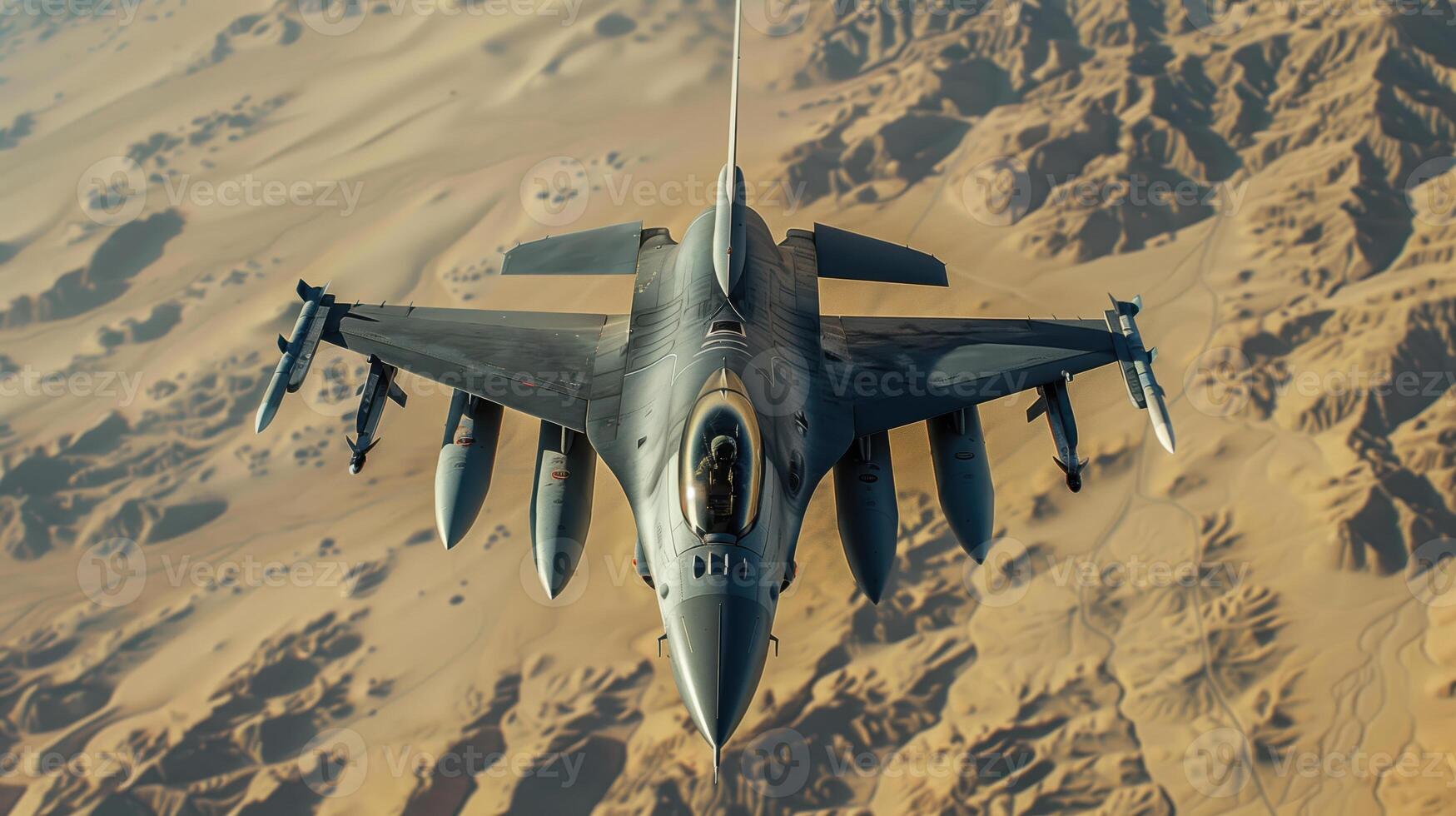 F-16 Fighter Jet Flying High Above Desert Landscape in Clear Sky photo