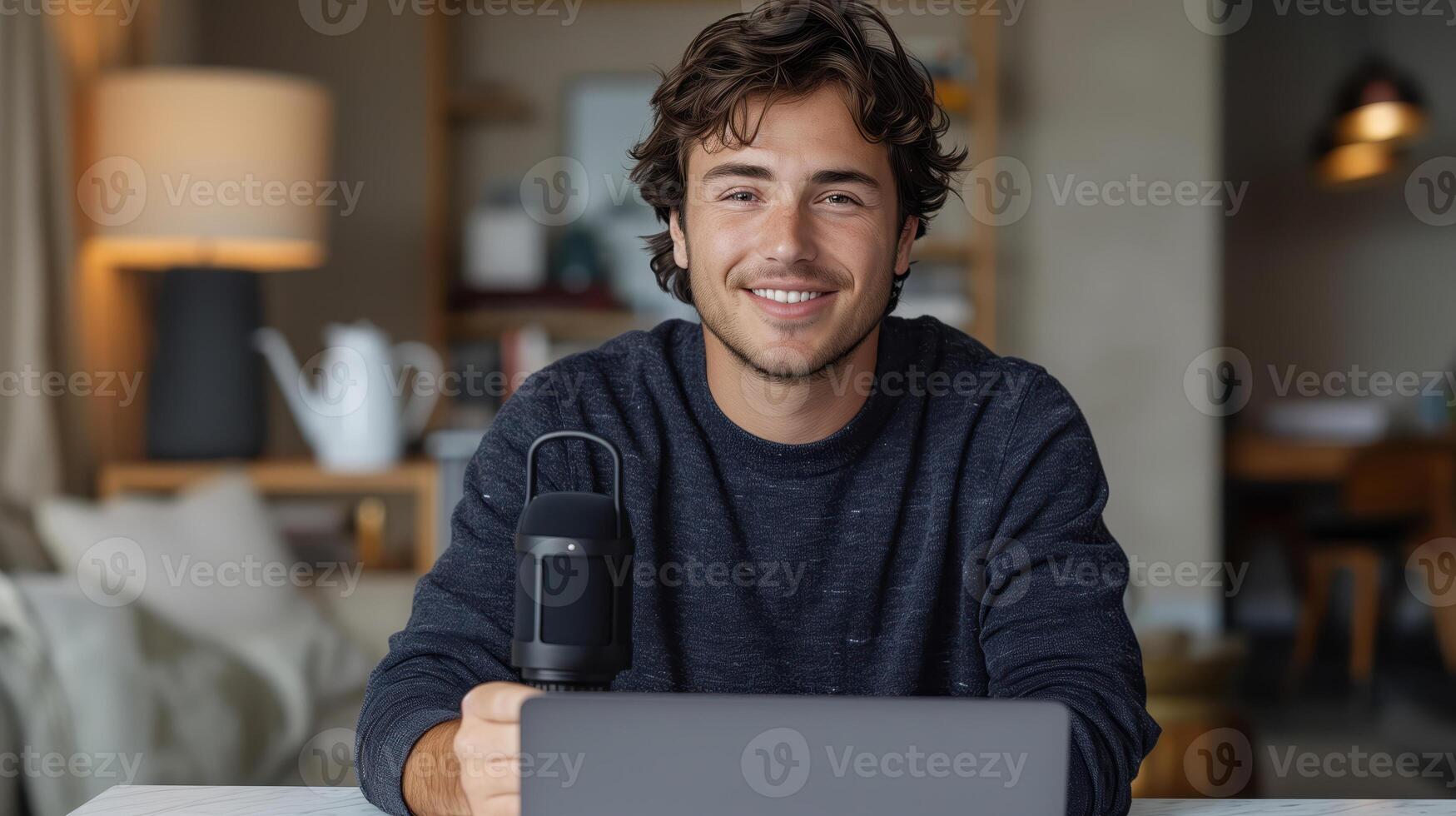 Smiling Man Recording a YouTube at Home with a Professional Microphone photo