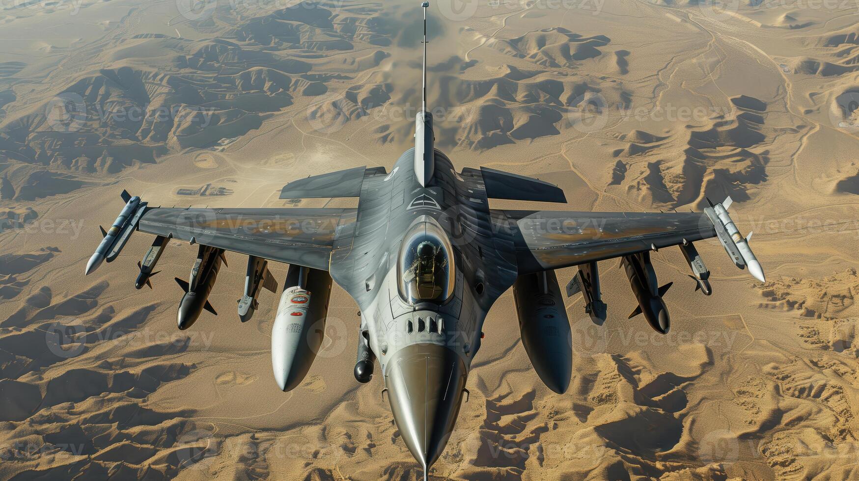 F16 Fighter Jet Flying High Above the Desert on a Clear Day photo