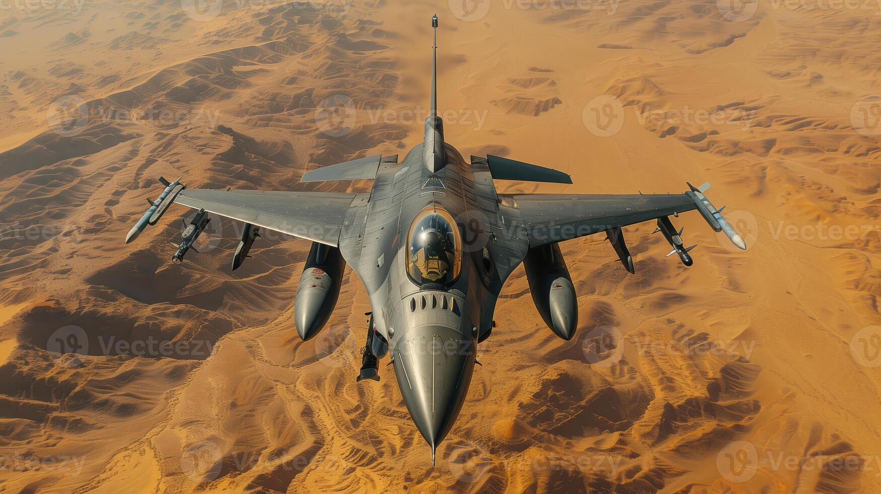 F-16 Fighter Jet Soaring Above Desert Landscape in Daylight photo