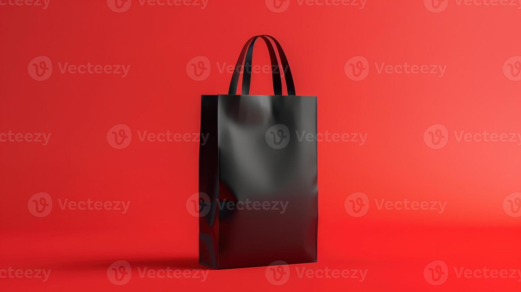 Elegant Black Tote Paper Bag on Striking Red Background - Perfect for Branding and Retail Design Concepts photo