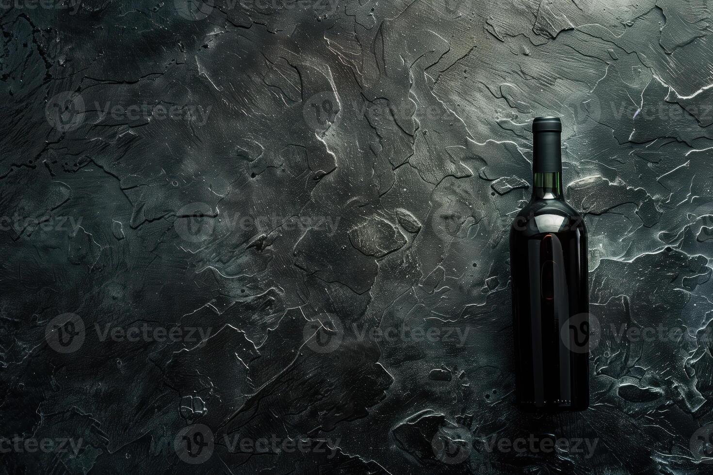 Elegant Dark Wine Bottle on Textured Slate Background with Dramatic Lighting Highlighting Contrast and Sophistication photo