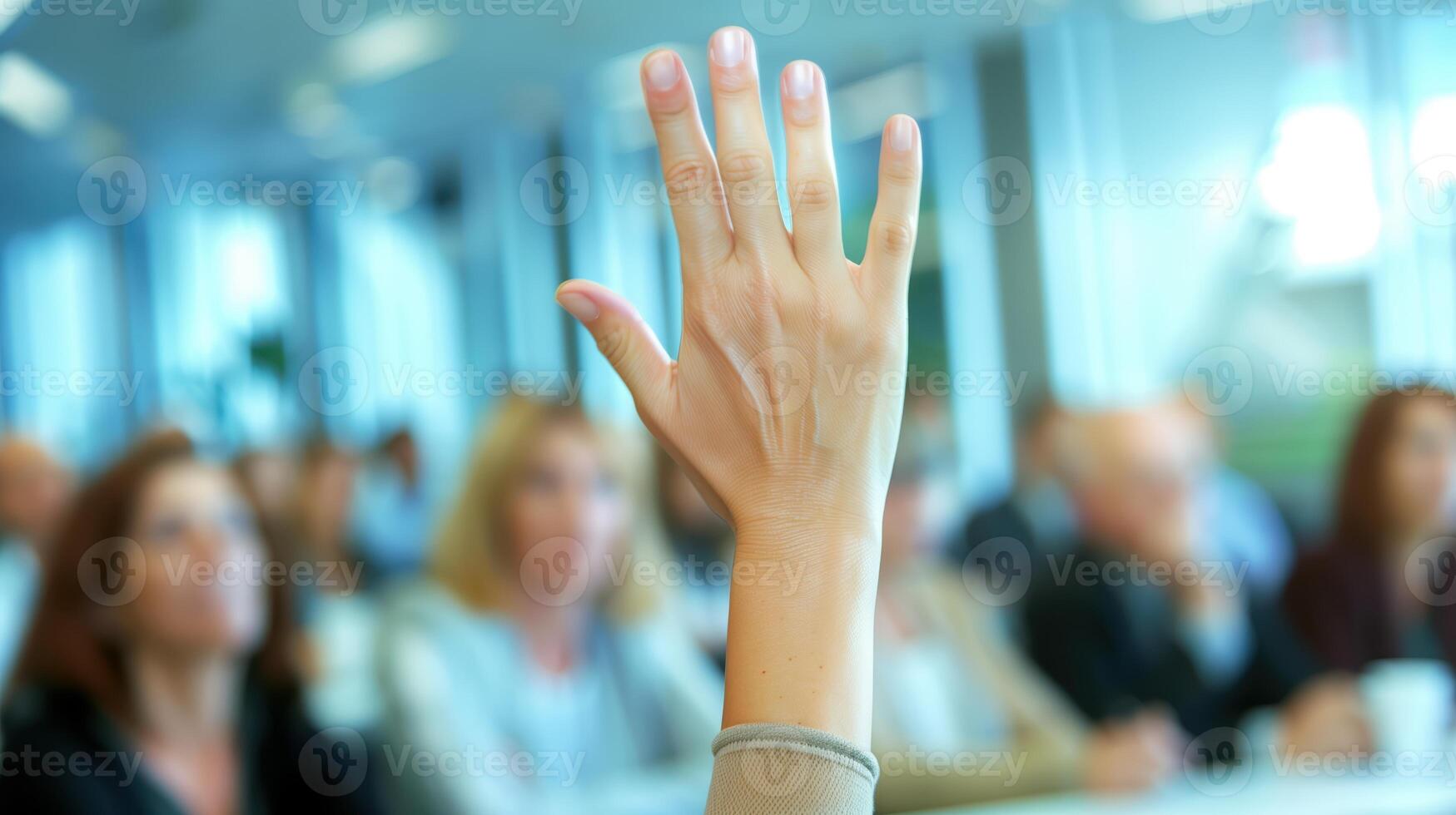 Professional Woman Raising Hand During Business Seminar in Modern Office Environment photo