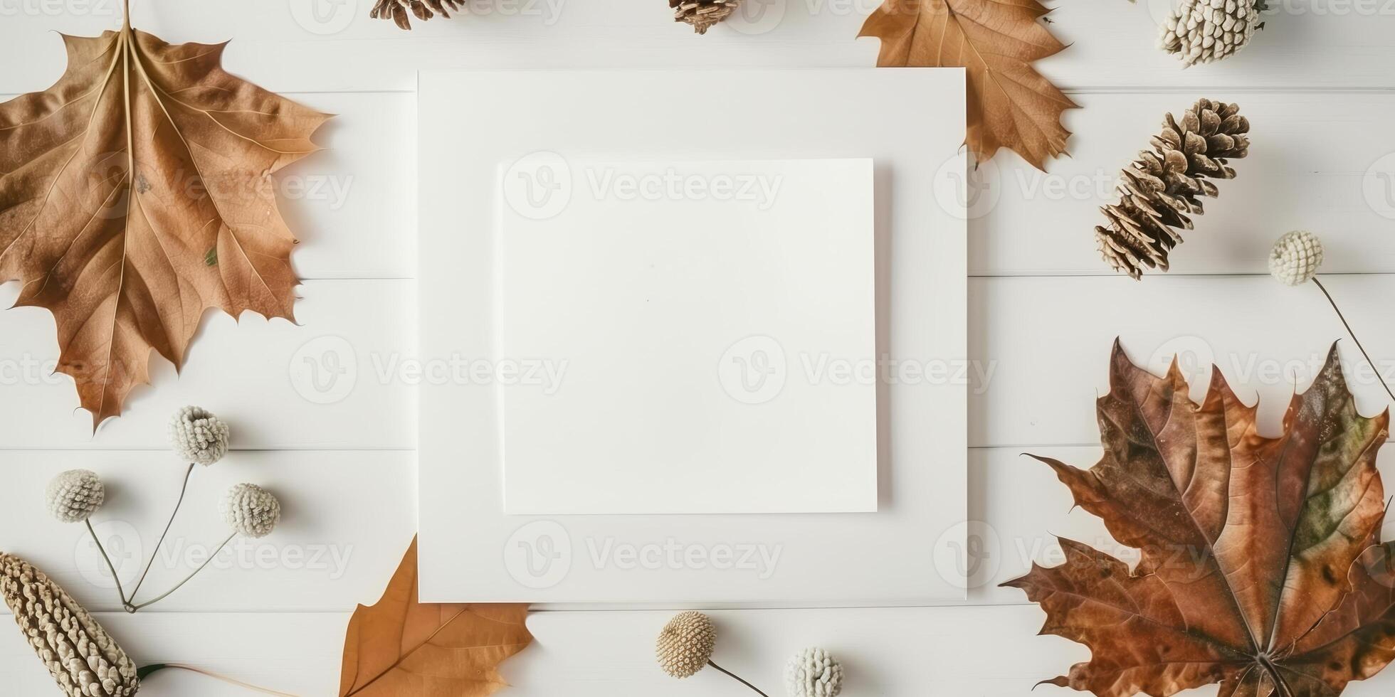 Autumn Mockup With Blank Postcard Surrounded by Fall Leaves and Pinecones on White Background photo