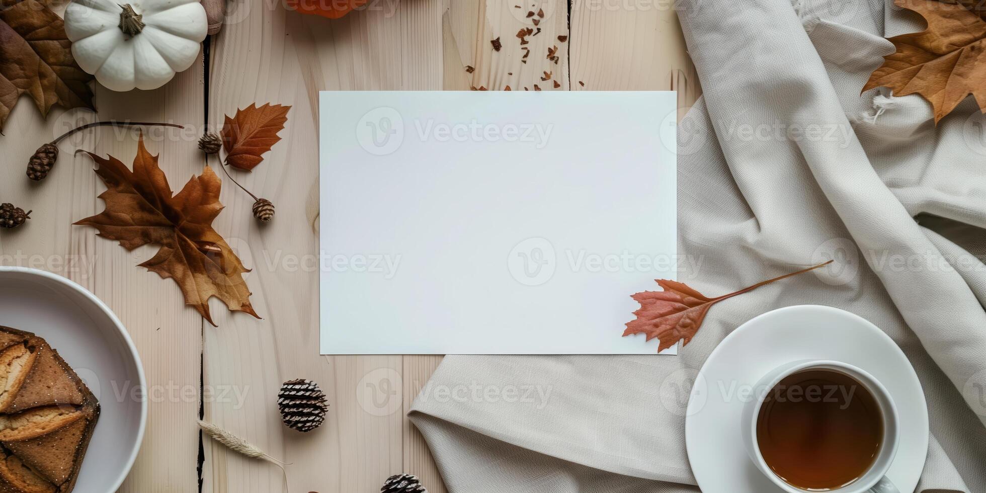 Autumn Mockup with Blank Card, Fall Leaves, Coffee, and Pumpkin photo