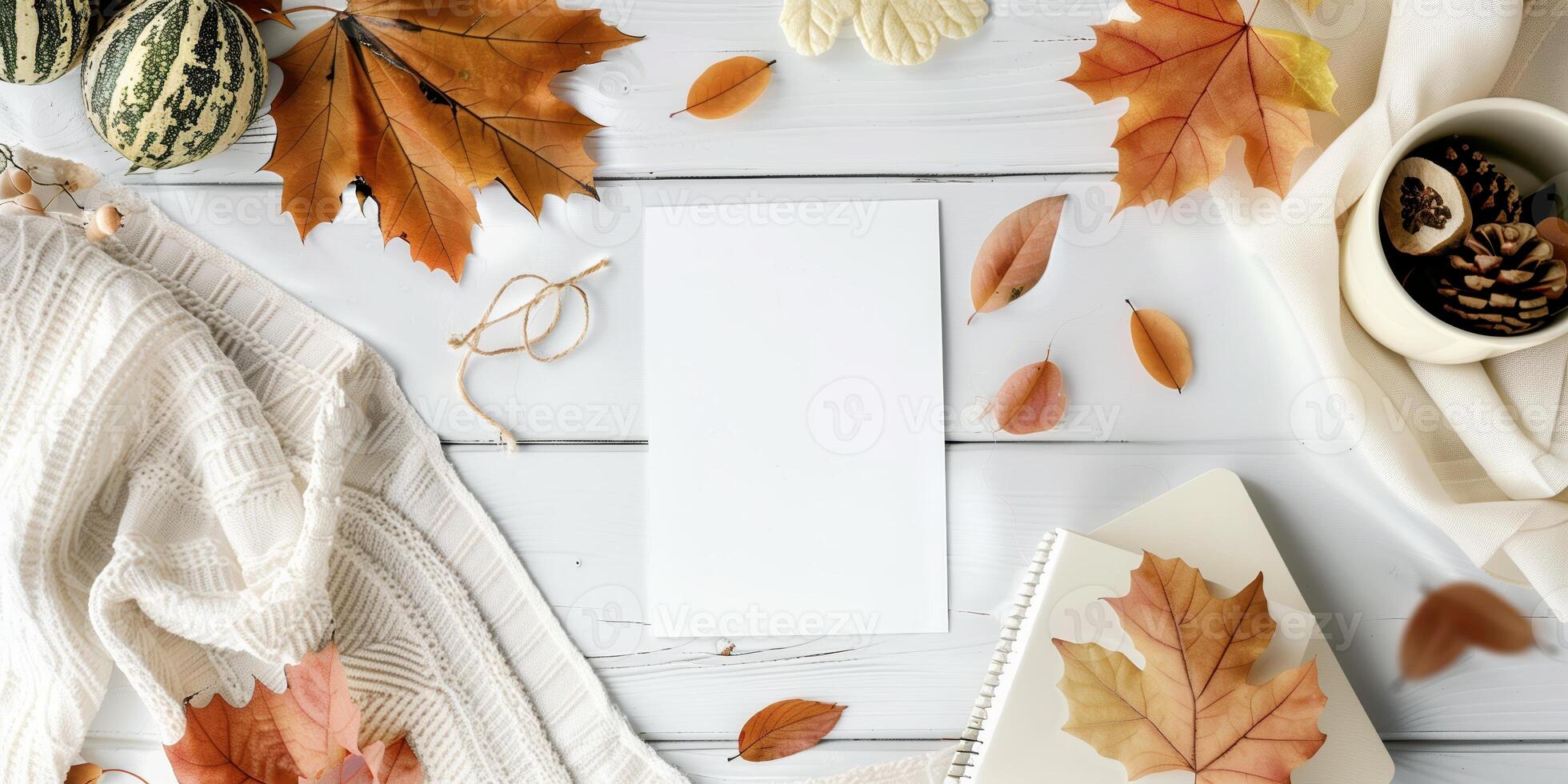 Autumn Mockup With Blank Postcard, Fall Leaves, and Cozy Elements on White Wooden Background photo