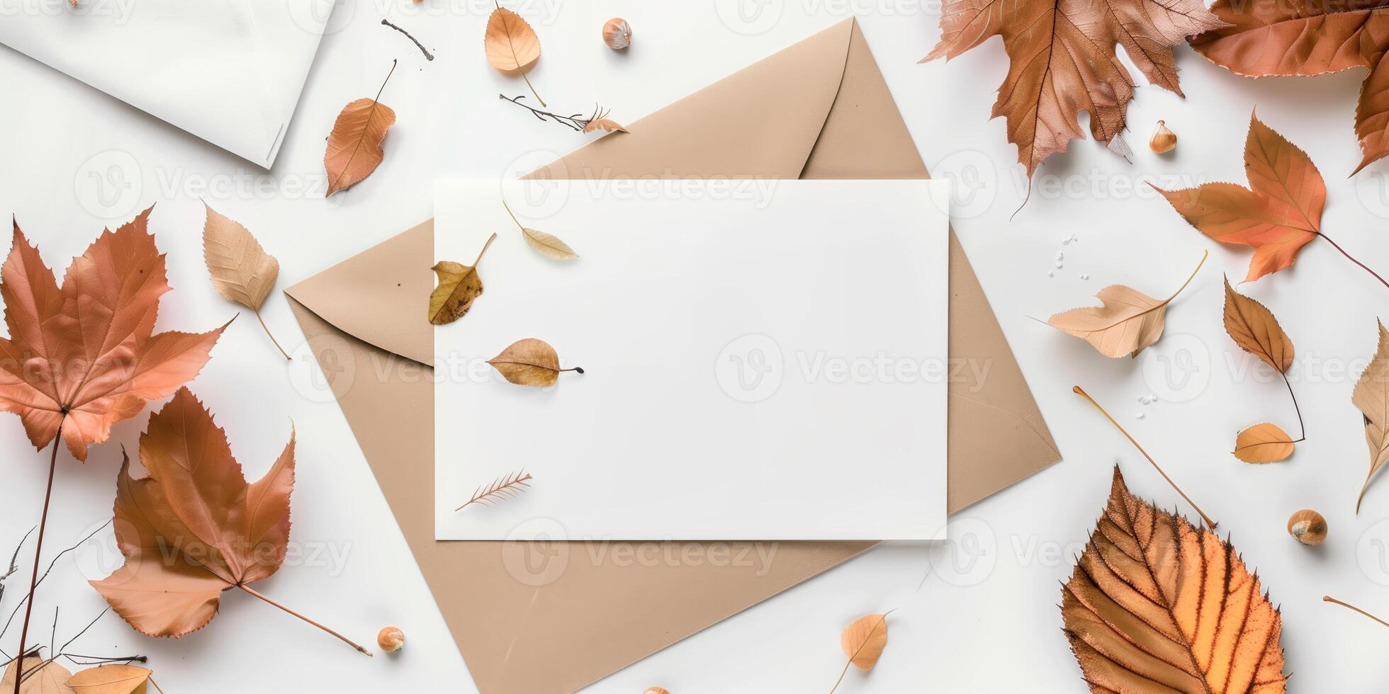 Blank Greeting Card Mockup with Autumn Leaves and Envelopes photo