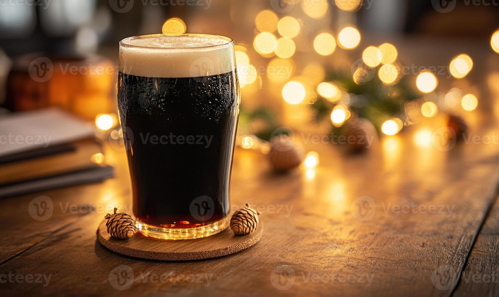 Pint of dark beer on wooden coaster, encircled by warm fairy lights photo