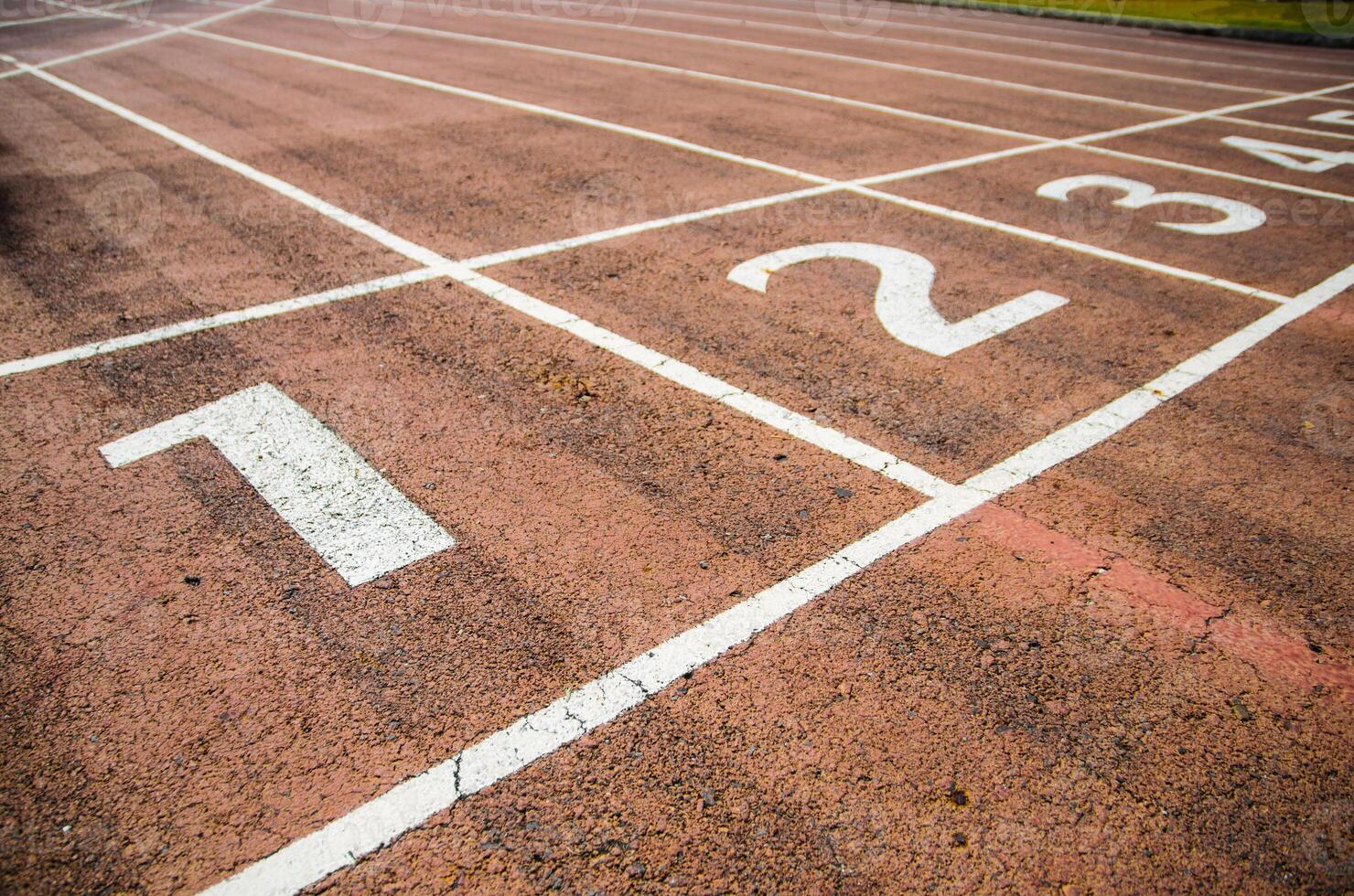 running track with close on numner one photo
