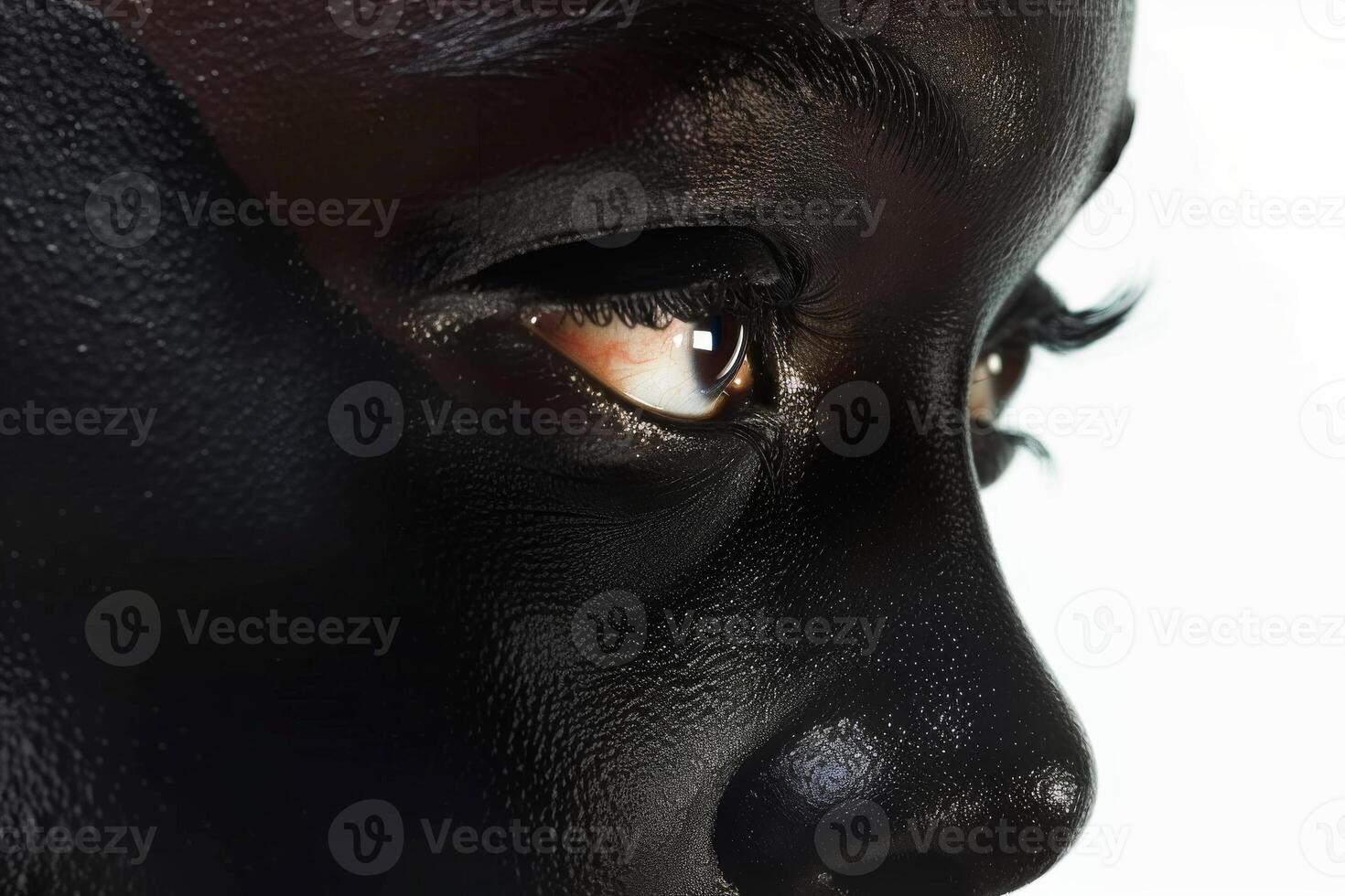 Close-up of the face of a man with dark skin photo