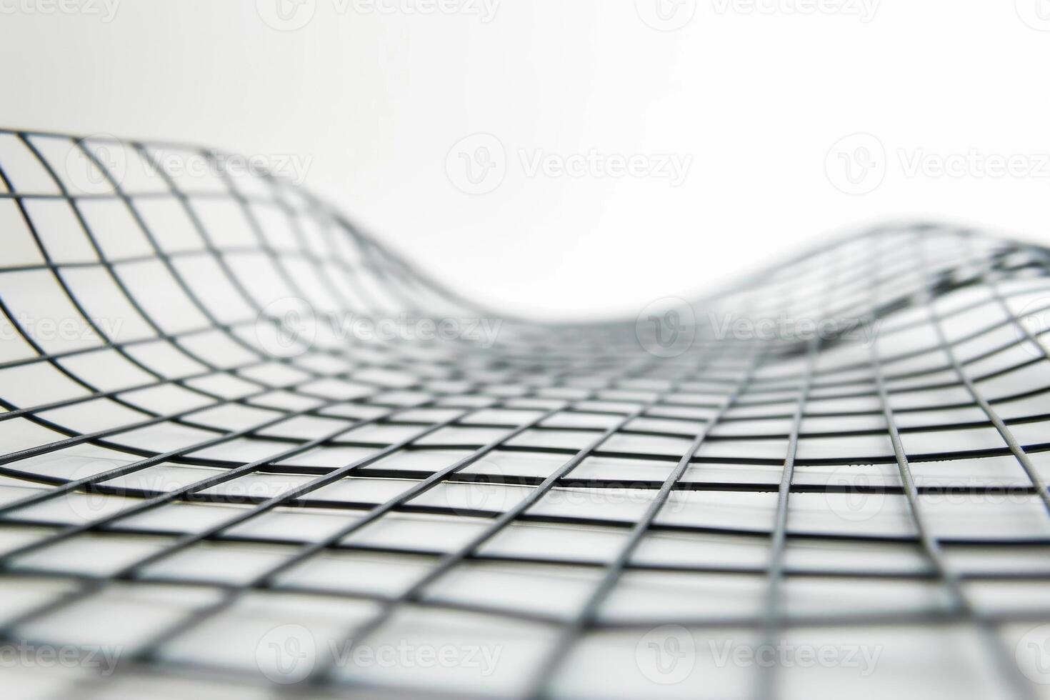 Black mesh surface with curves on white background photo