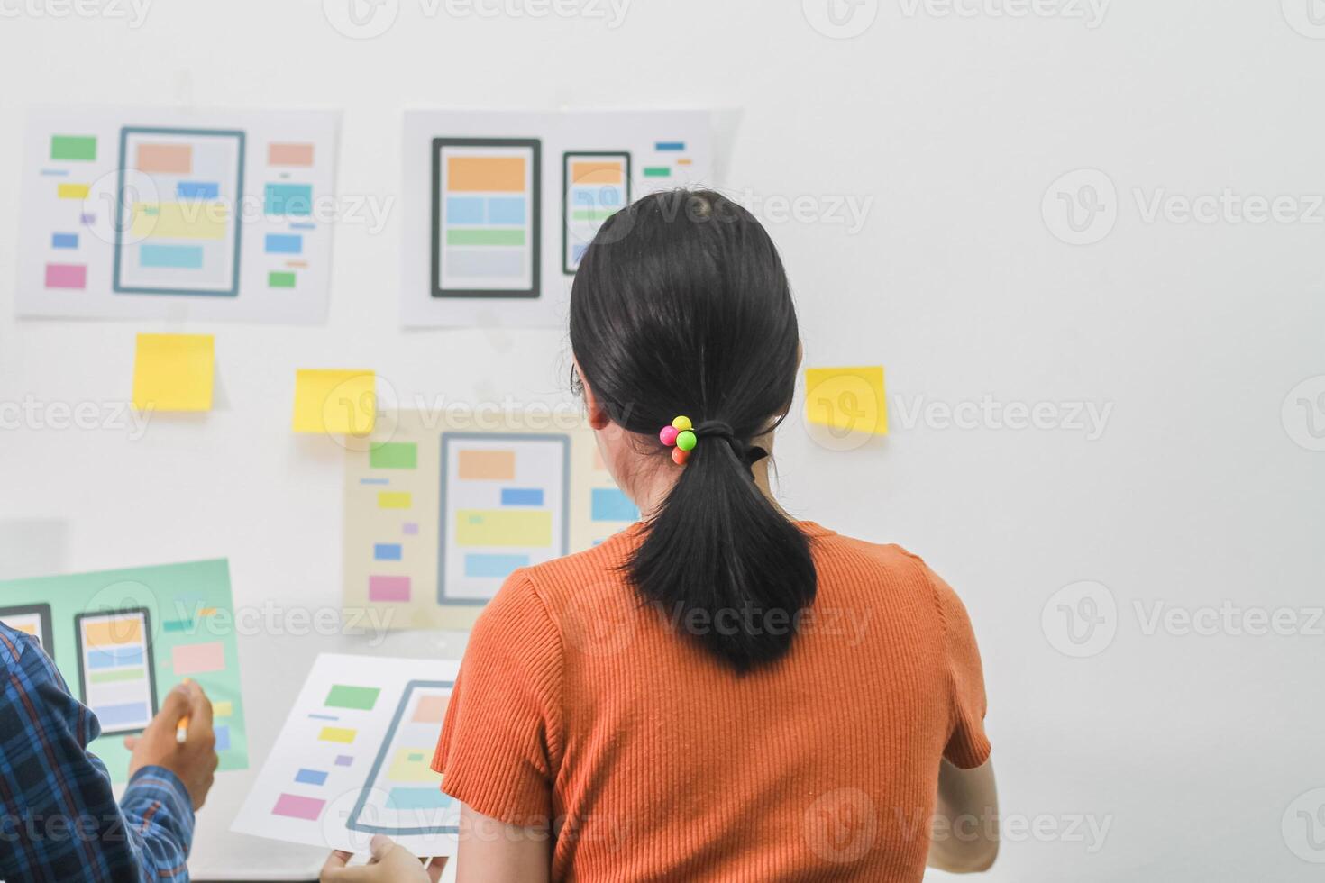 Smooth Focus, group of web designers are working together to develop mobile responsive website with UI UX Front End Designer Previewing. website designers in form of mobile applications with UI UX photo