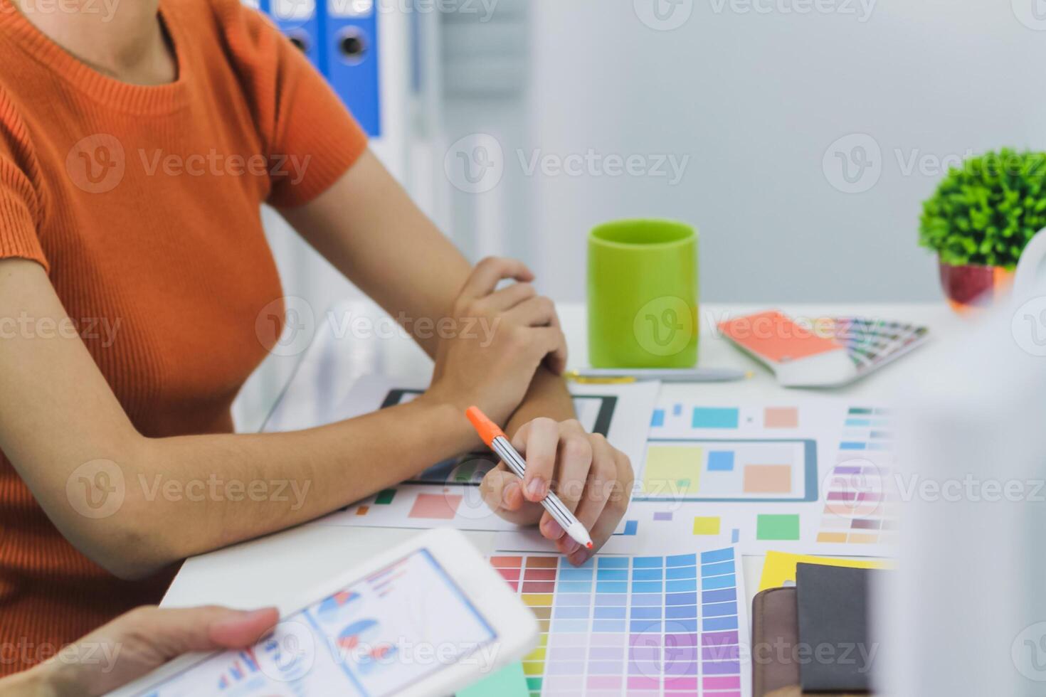 Smooth Focus, group of web designers are working together to develop mobile responsive website with UI UX Front End Designer Previewing. website designers in form of mobile applications with UI UX photo