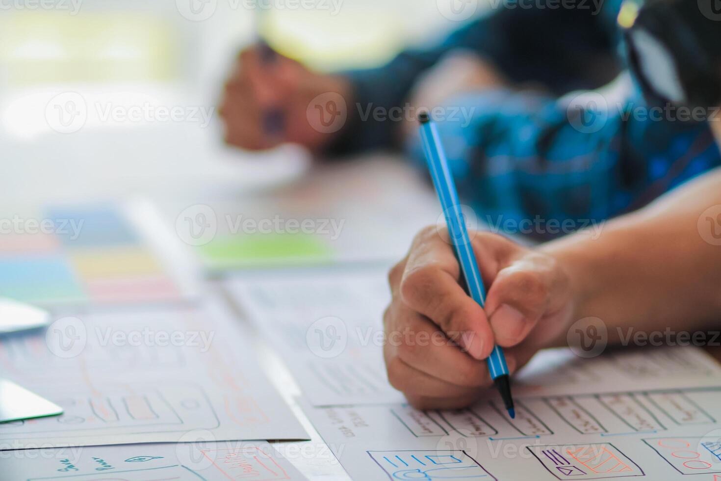 Smooth Focus, group of web designers are working together to develop mobile responsive website with UI UX Front End Designer Previewing. website designers in form of mobile applications with UI UX photo