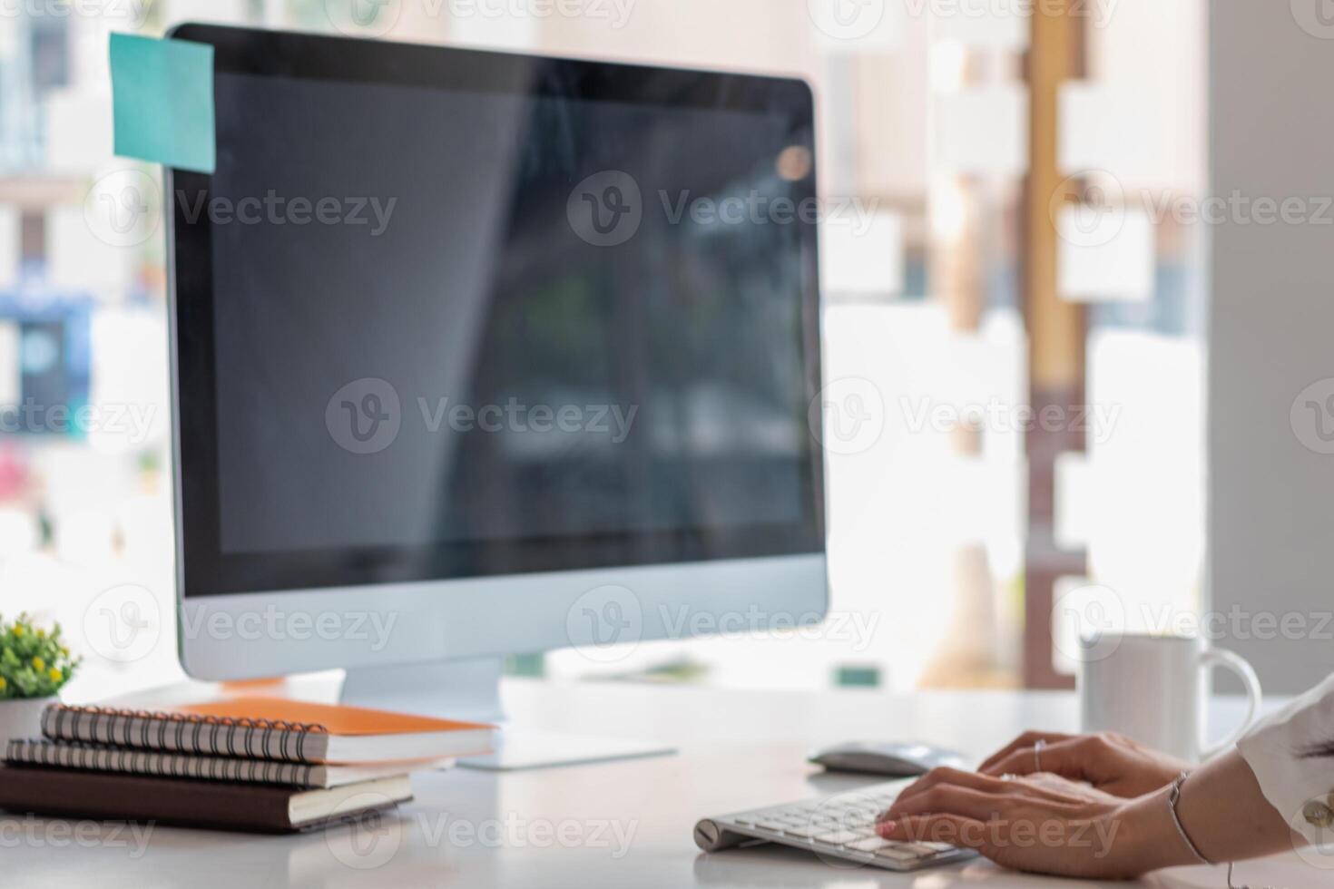 A businesswoman is using a laptop to communicate and check work from home online because she is starting a business that can order and check from anywhere online.online business ideas photo