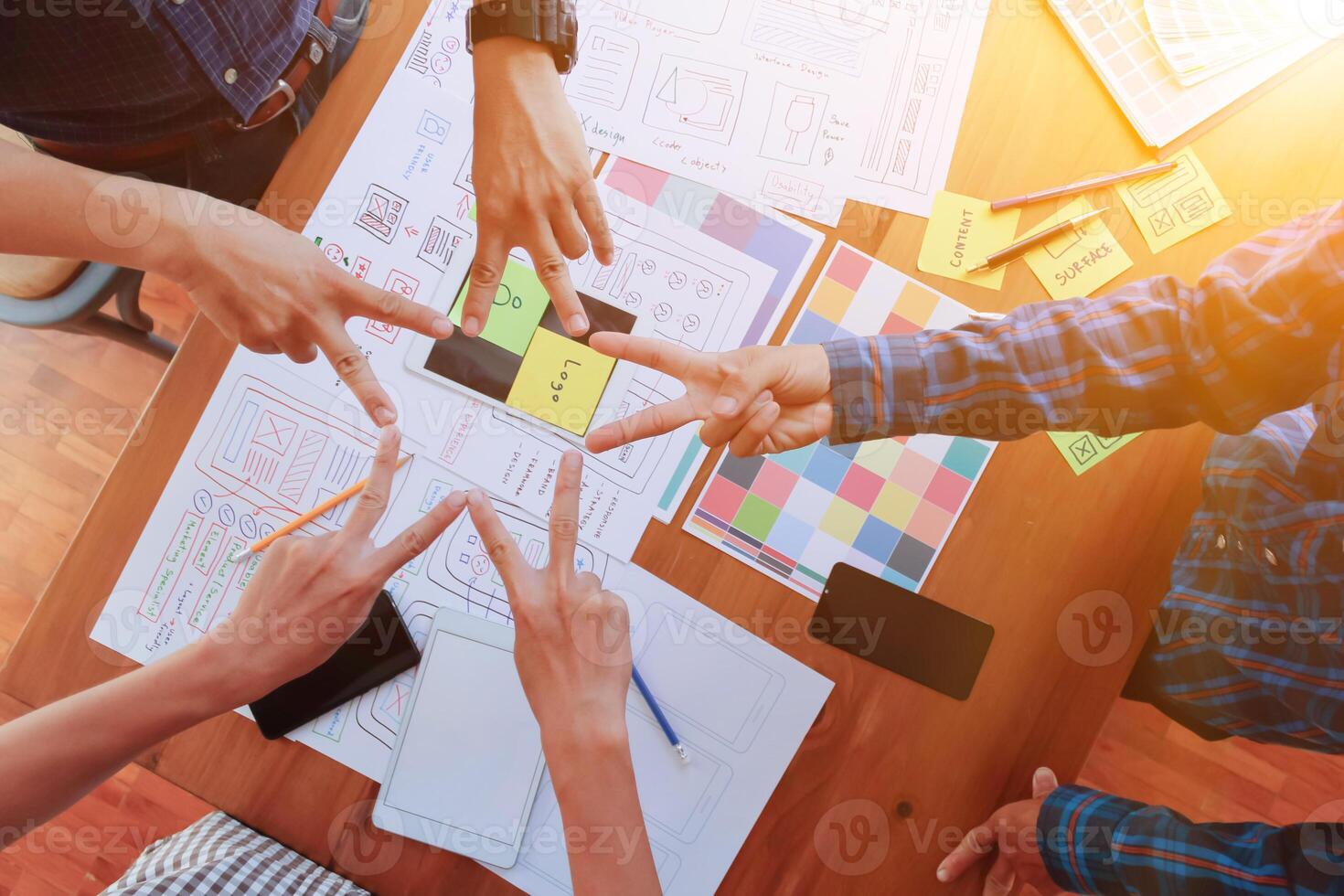Smooth Focus, group of web designers are working together to develop mobile responsive website with UI UX Front End Designer Previewing. website designers in form of mobile applications with UI UX photo