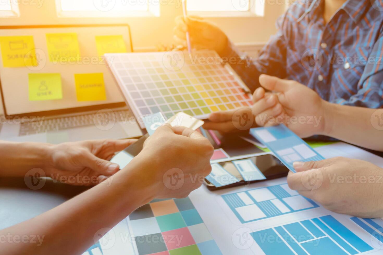 Smooth Focus, group of web designers are working together to develop mobile responsive website with UI UX Front End Designer Previewing. website designers in form of mobile applications with UI UX photo