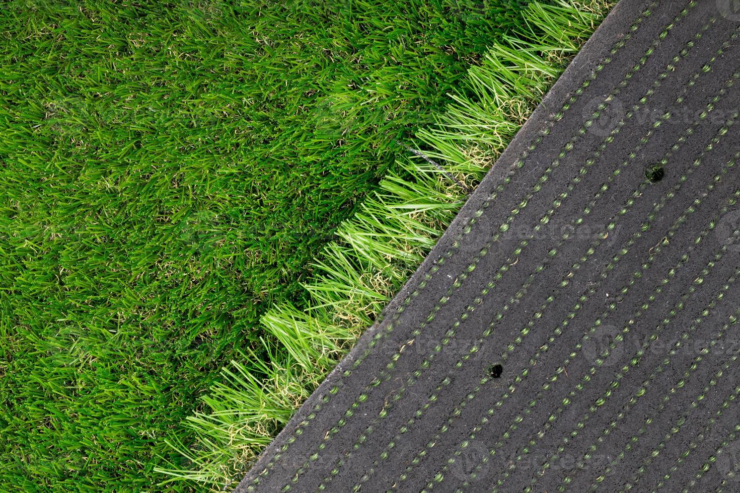 Artificial Turf Installation with Exposed Backing photo