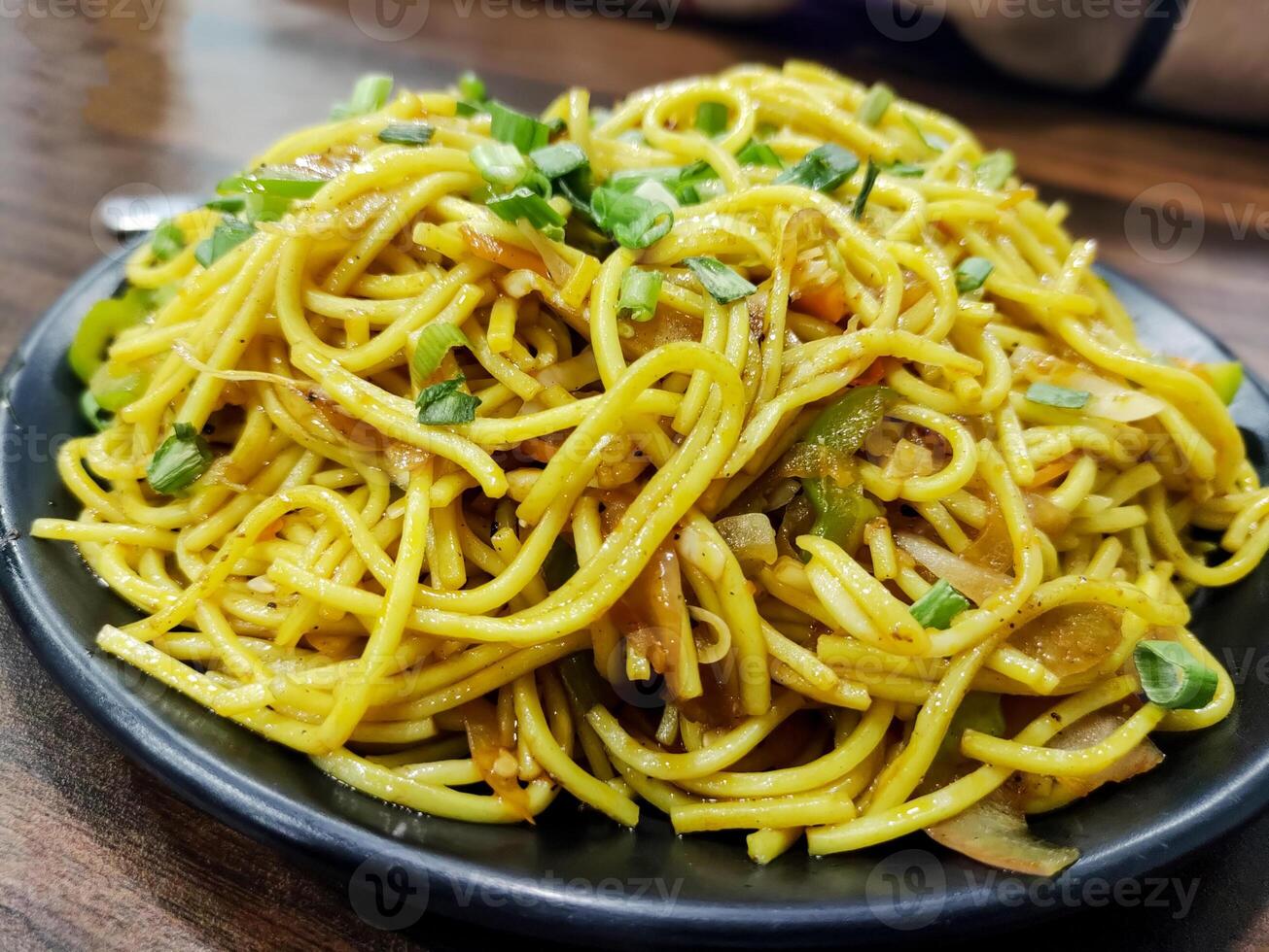 Schezwan Noodles or vegetable Hakka Noodles or chow mein photo