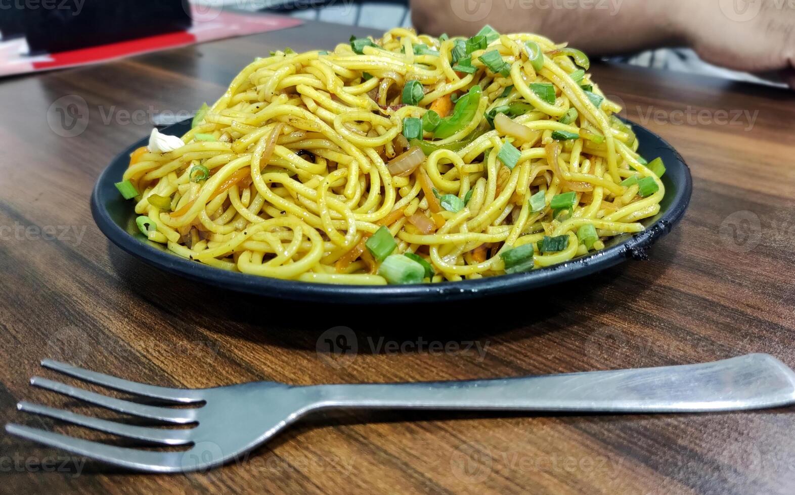 Schezwan Noodles or vegetable Hakka Noodles or chow mein photo