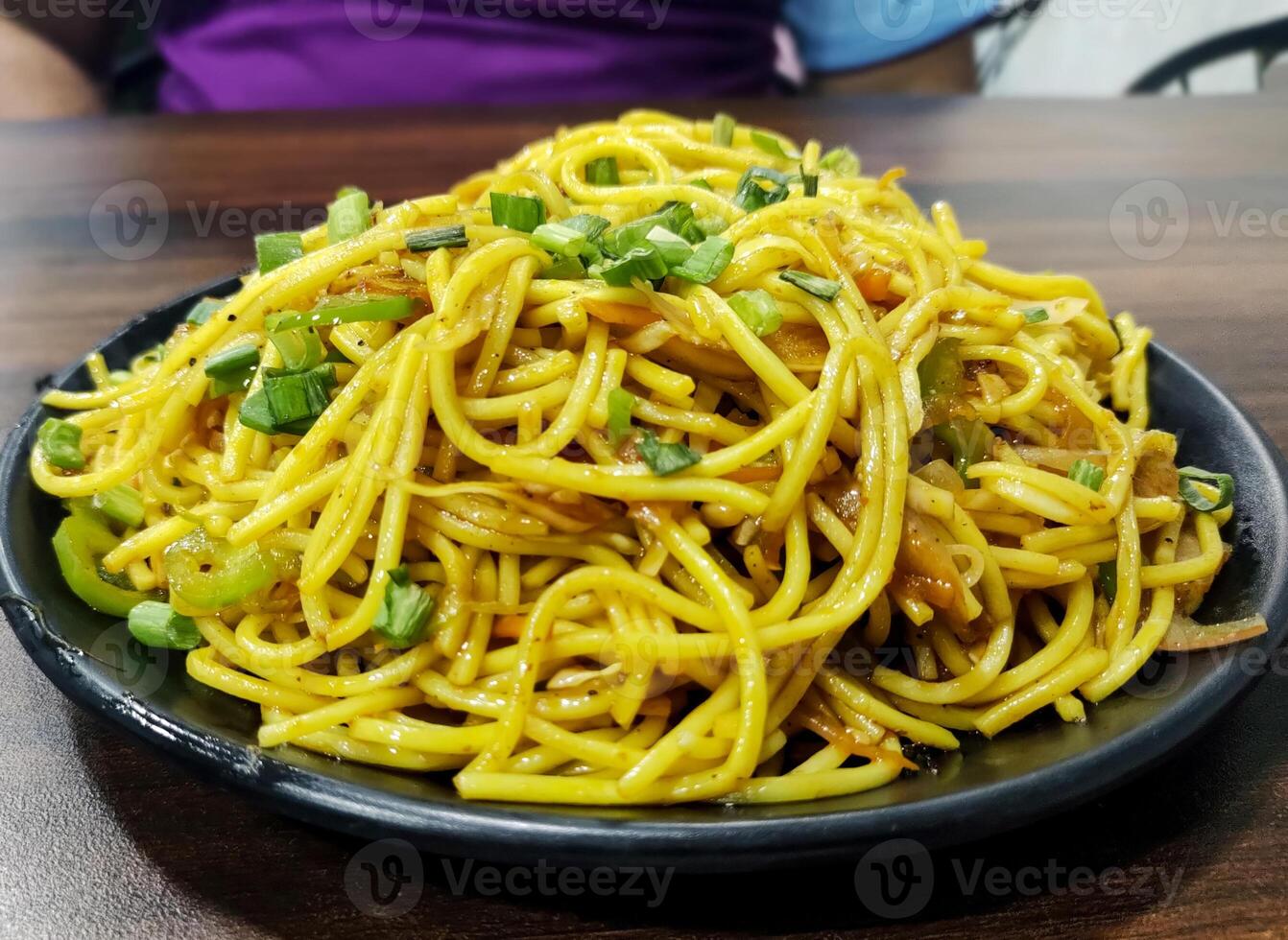 Schezwan Noodles or vegetable Hakka Noodles or chow mein photo