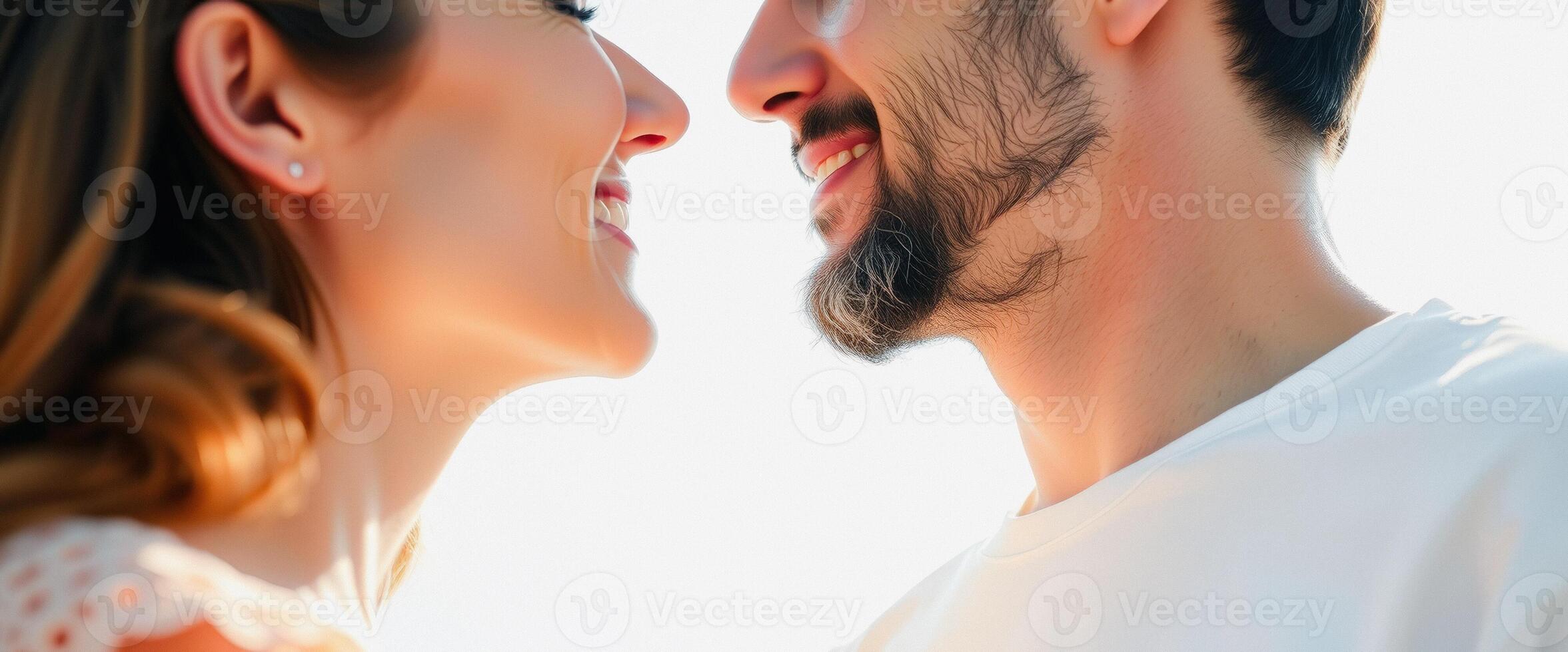 Close-up of a couple smiling at each other photo