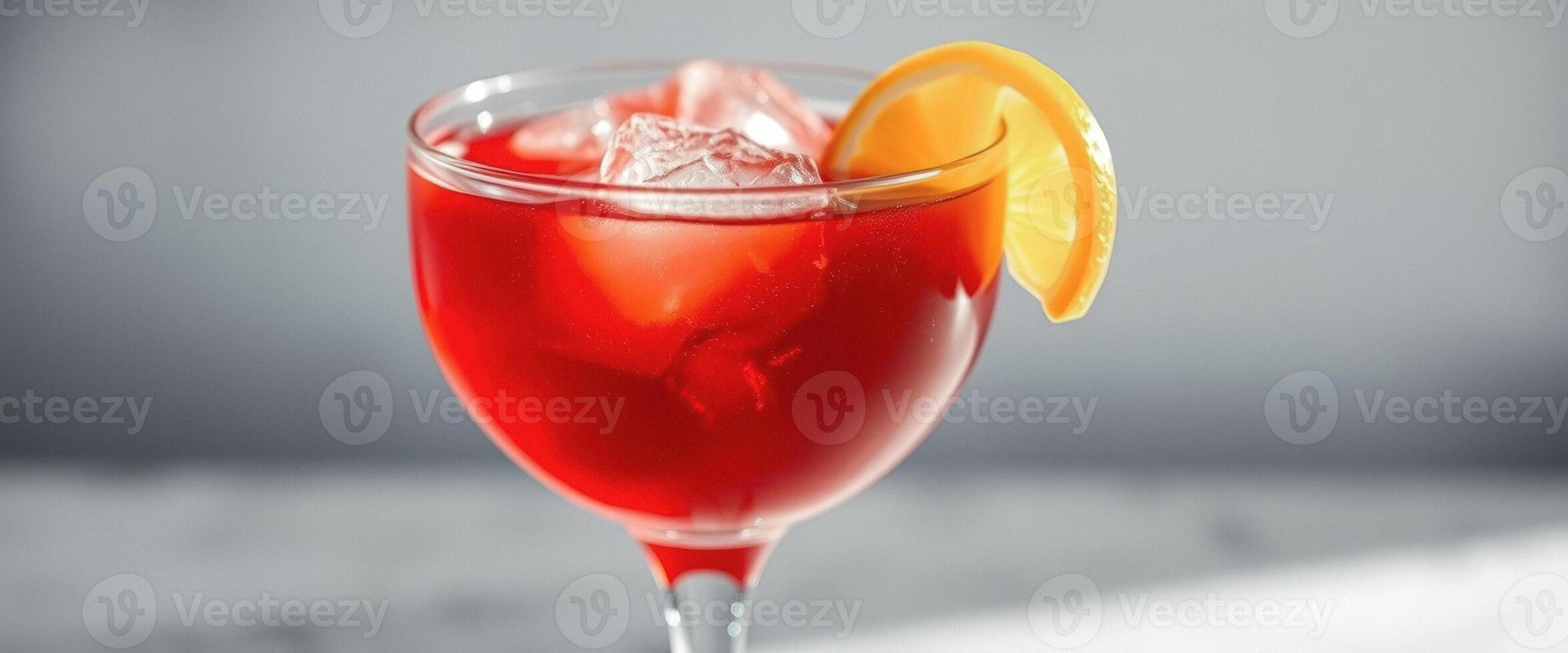 Refreshing Red Cocktail with Orange Slice photo