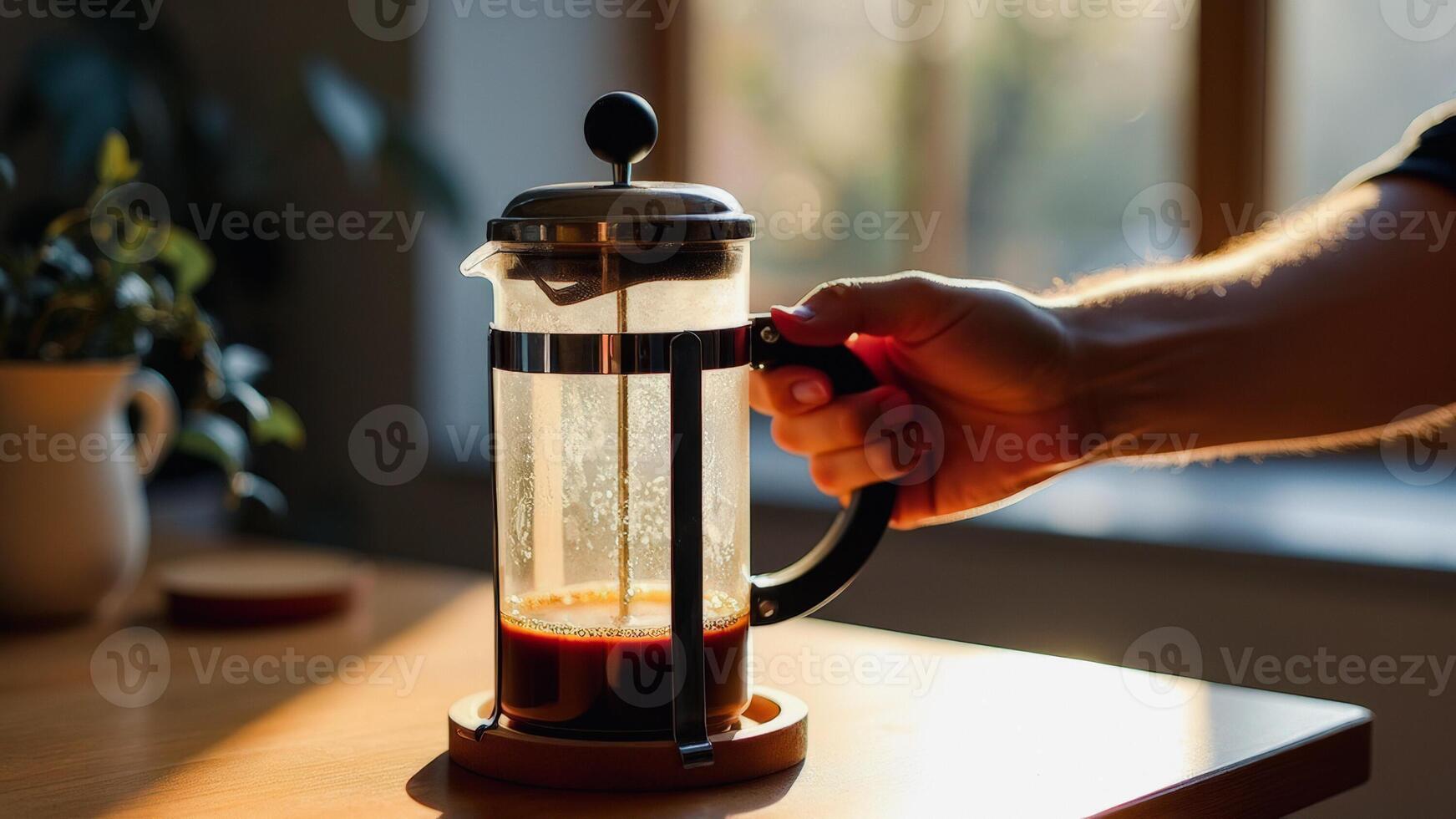 Brewing Fresh Coffee in a French Press photo