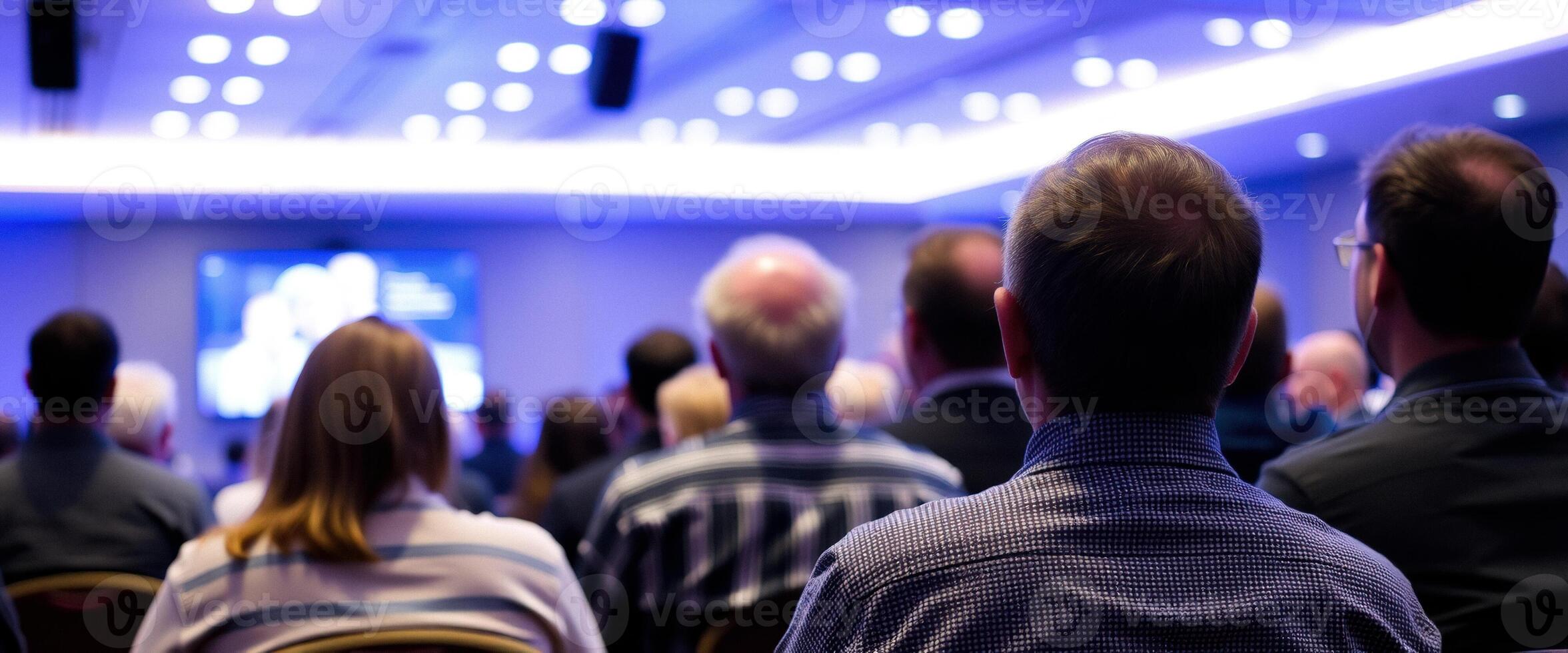 Attentive Audience Listening to Presentation photo