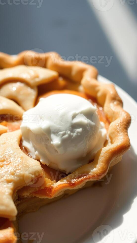 Closeup of Peach Pie with Ice Cream photo
