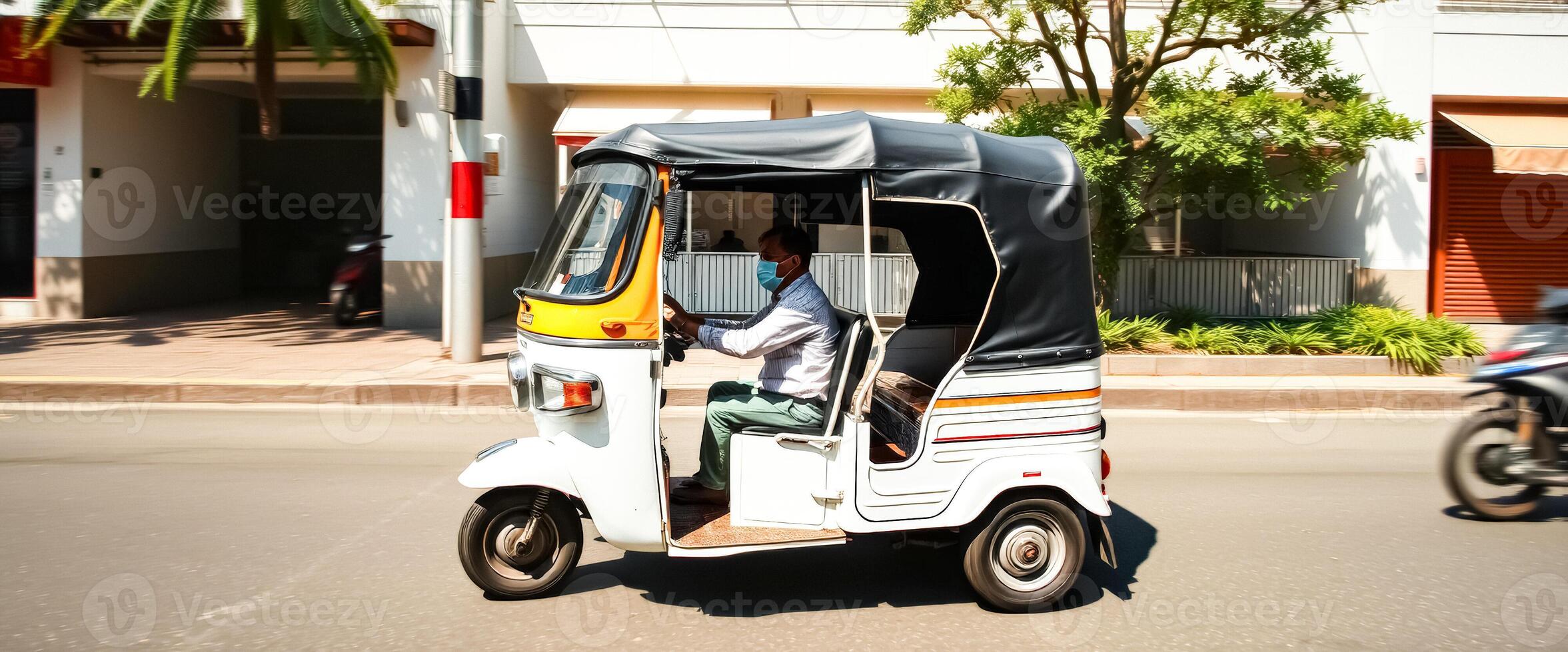 Tuk Tuk Driver Wearing Face Mask in City photo