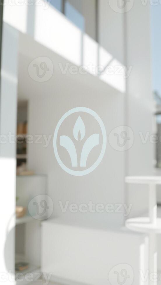 Minimalist white logo on glass door with blurred background photo