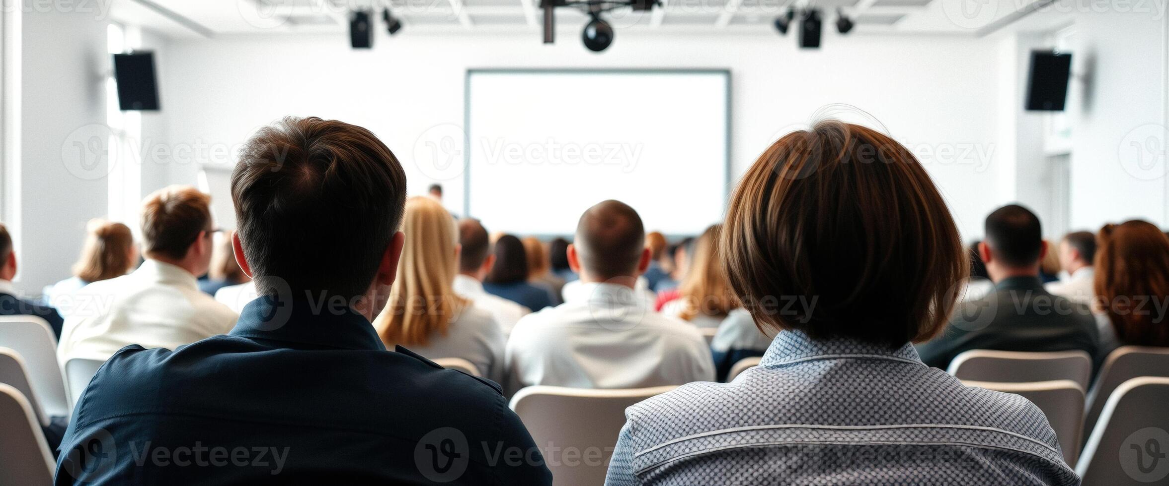 Attentive Audience Listening to a Presentation photo