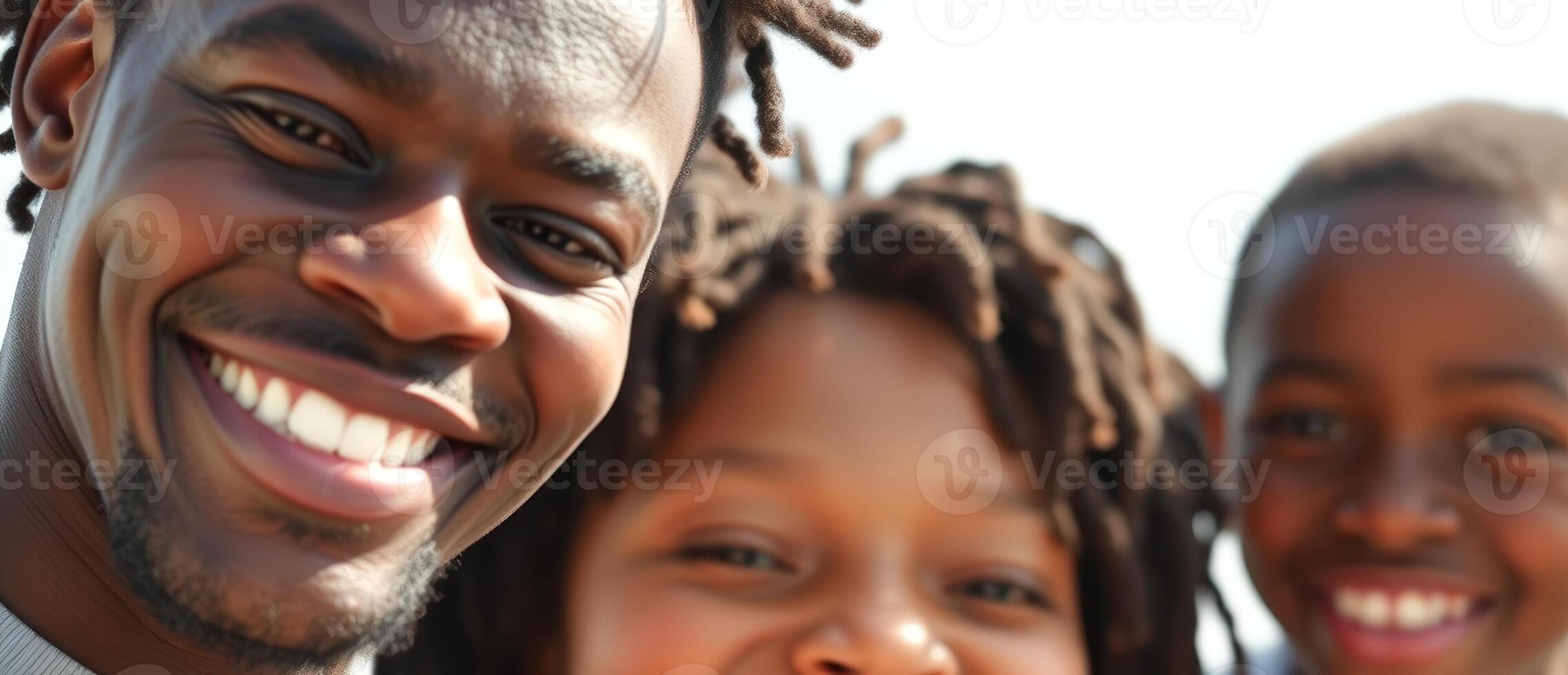 Happy African American family smiling for the camera photo