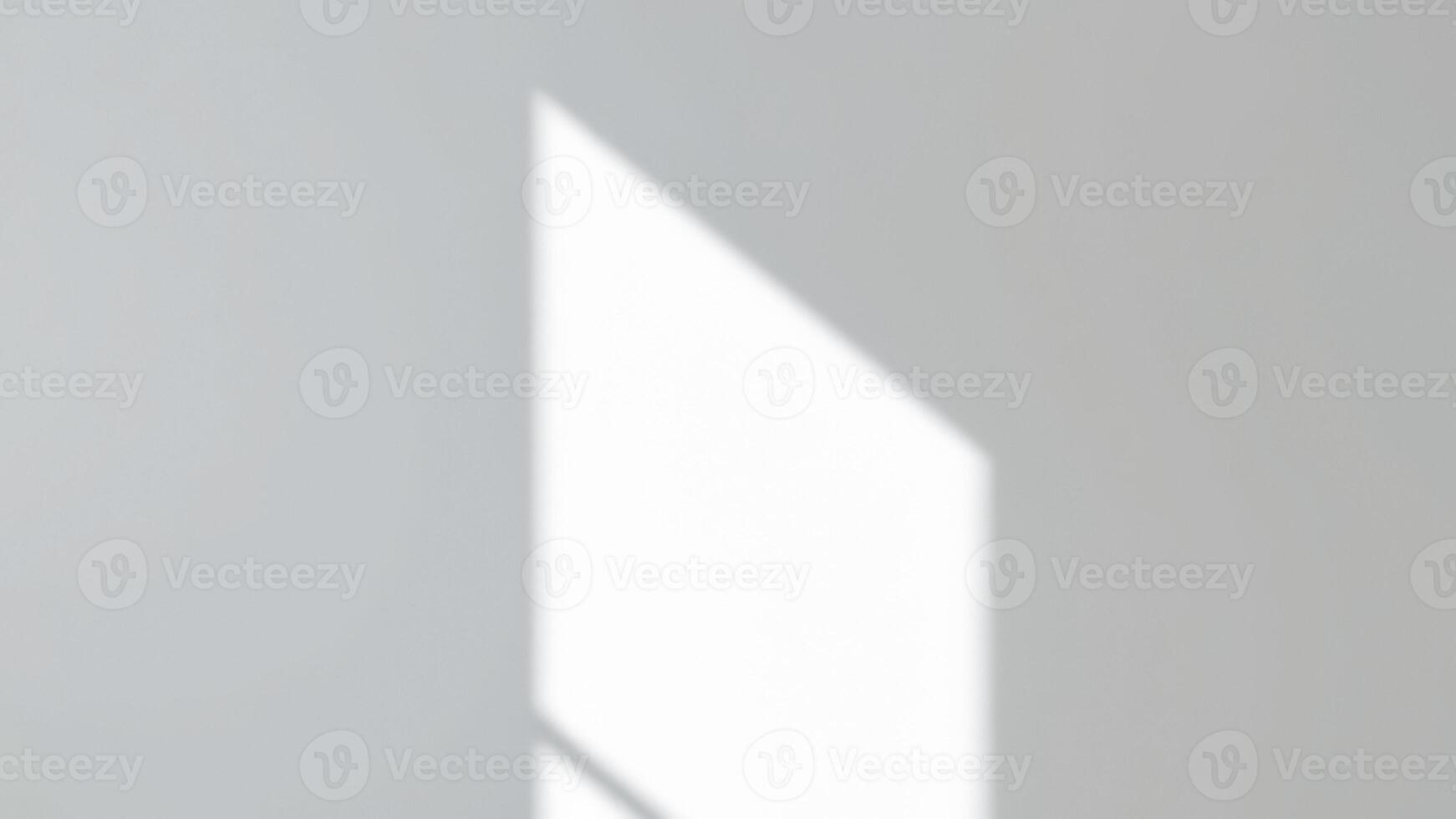 Abstract Light and Shadow on White Wall photo