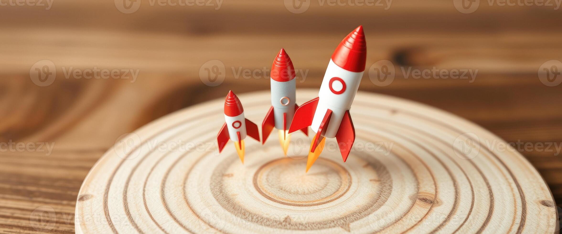 Three Rockets Launching Upwards on Wooden Target photo