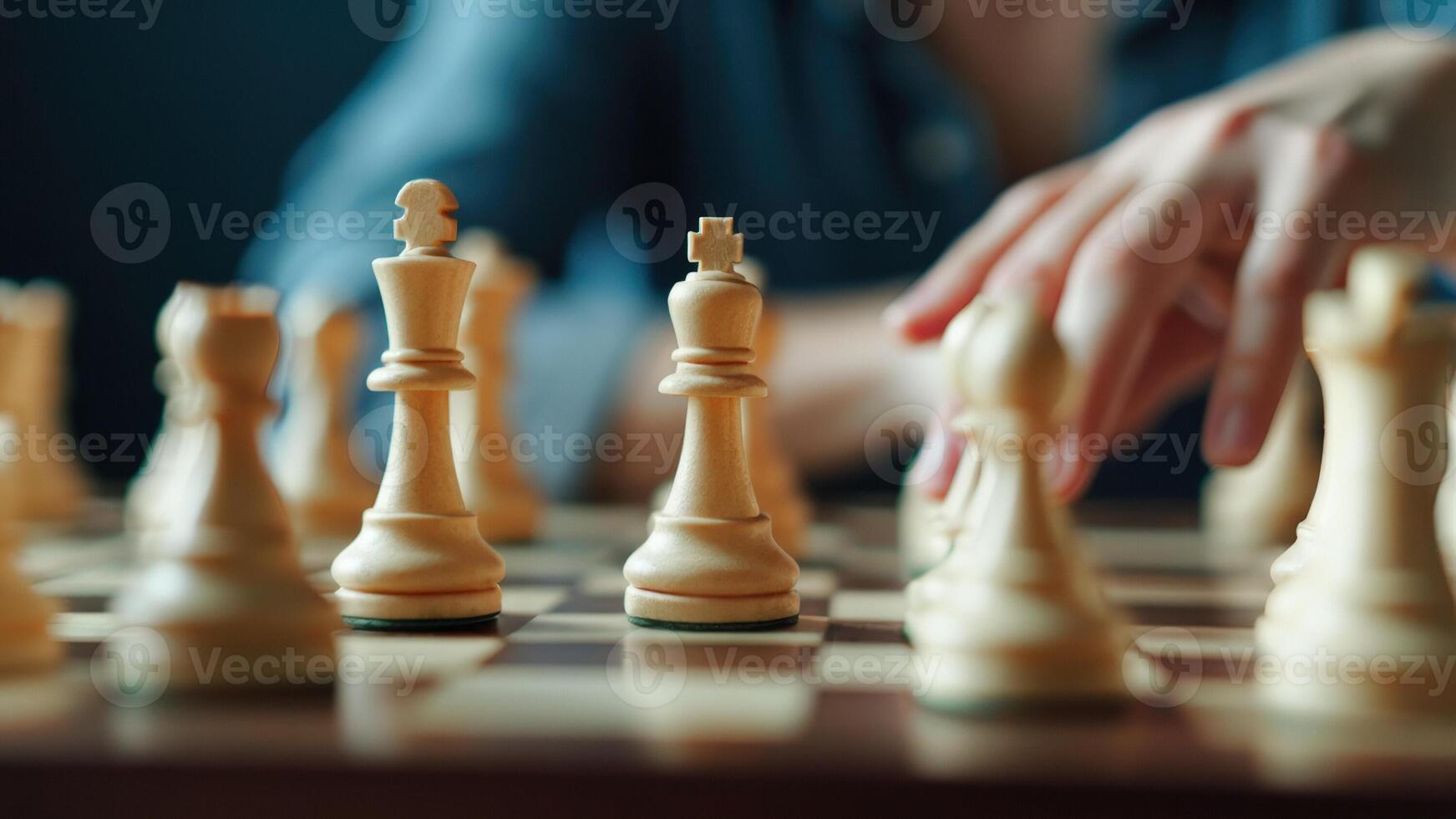Close Up of Chess Pieces on a Chessboard photo