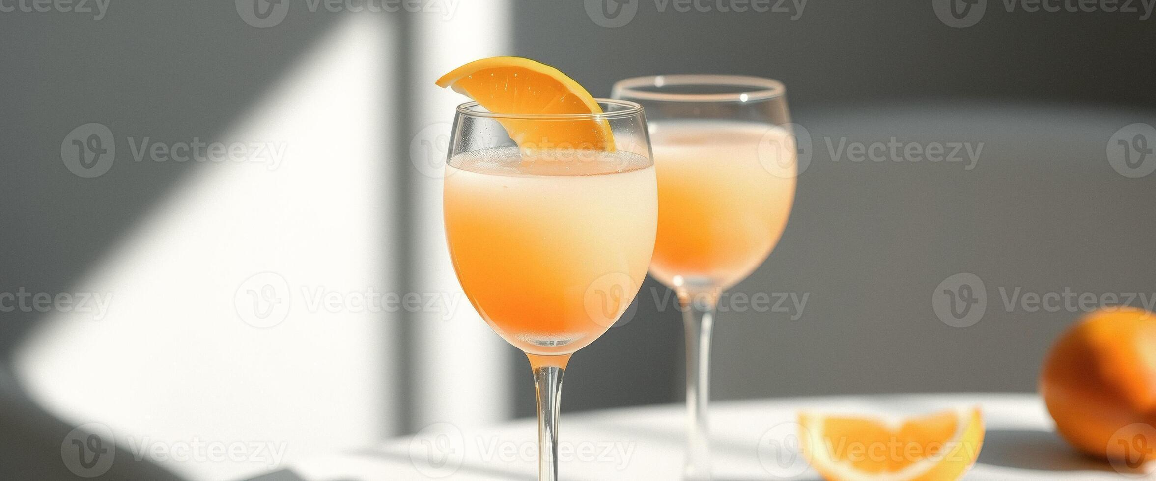 Two Orange Cocktails with Orange Slices photo