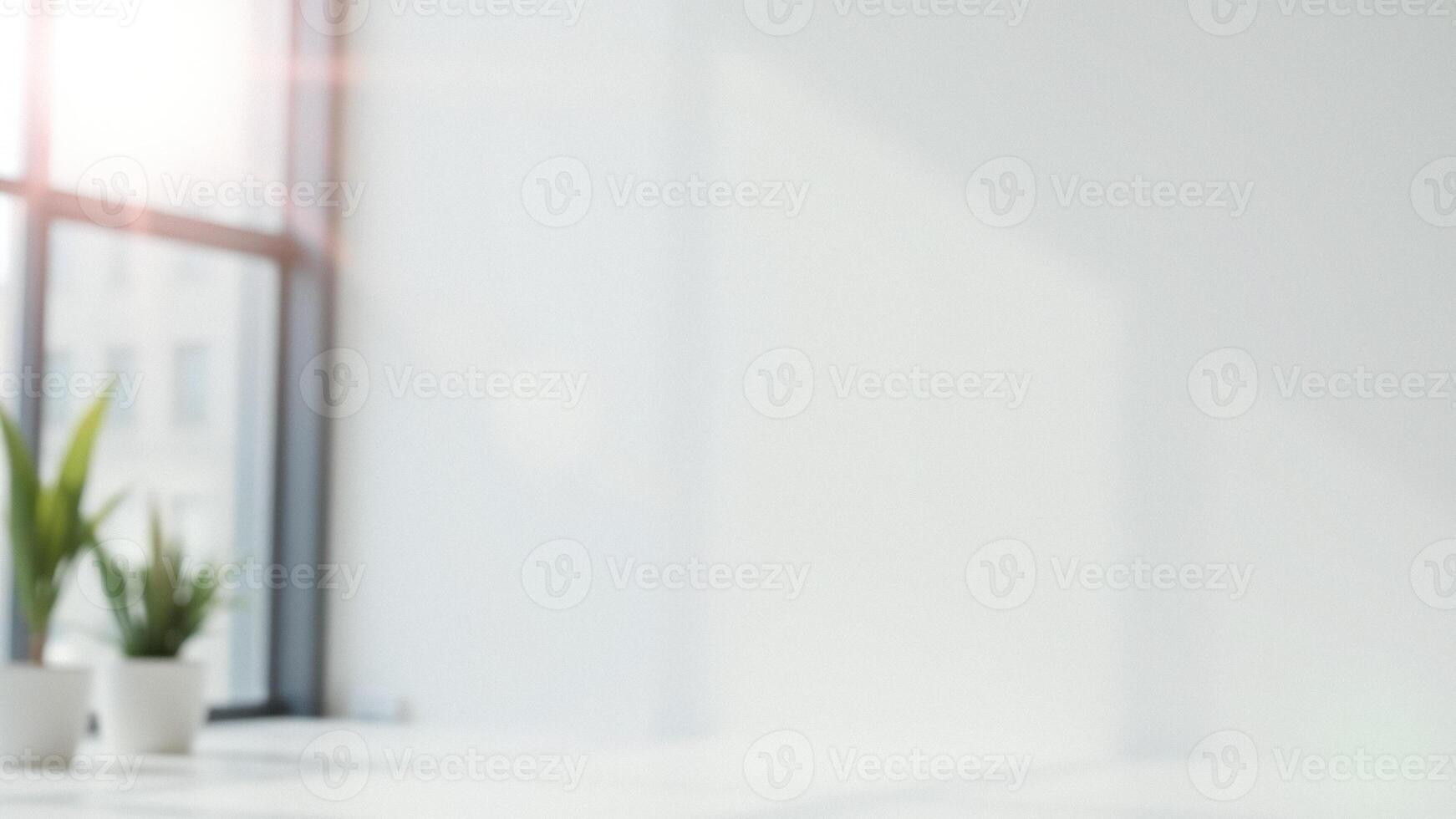 Blurry Background of a White Wall with a Window and Plants photo