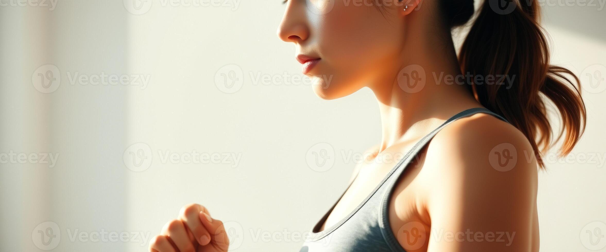 Side View of Woman in Grey Tank Top photo