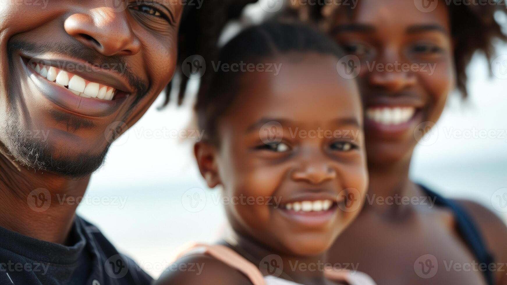 Happy family smiling at the camera photo