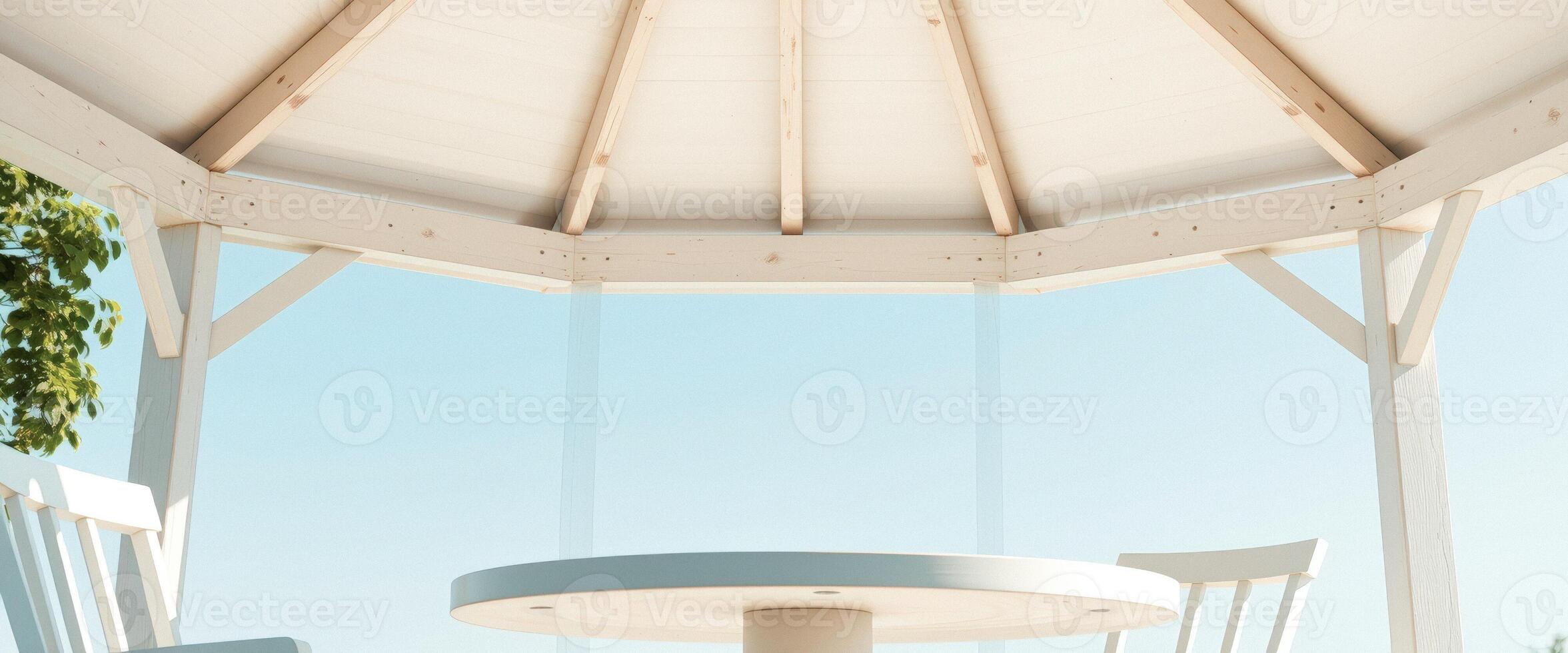 White Gazebo with Chairs and Table photo