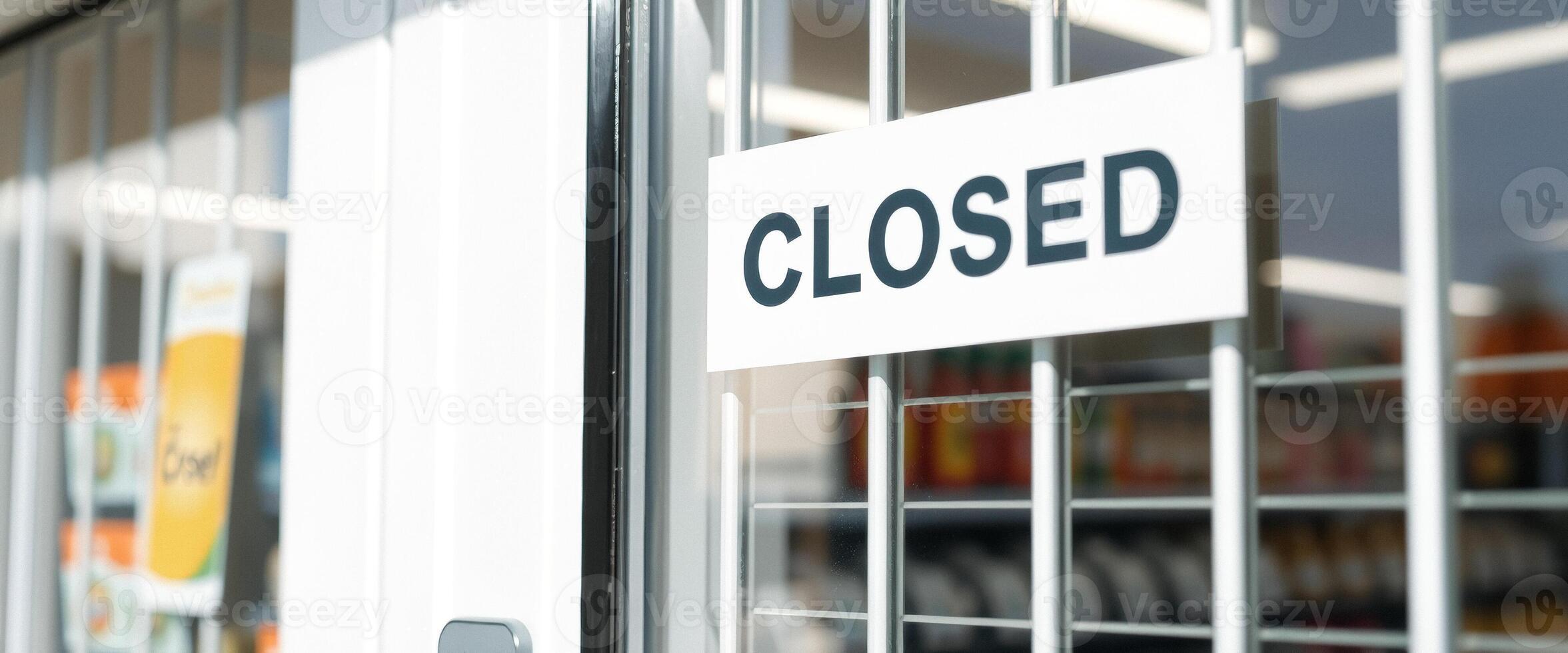 Closed Sign on a Shop Window photo