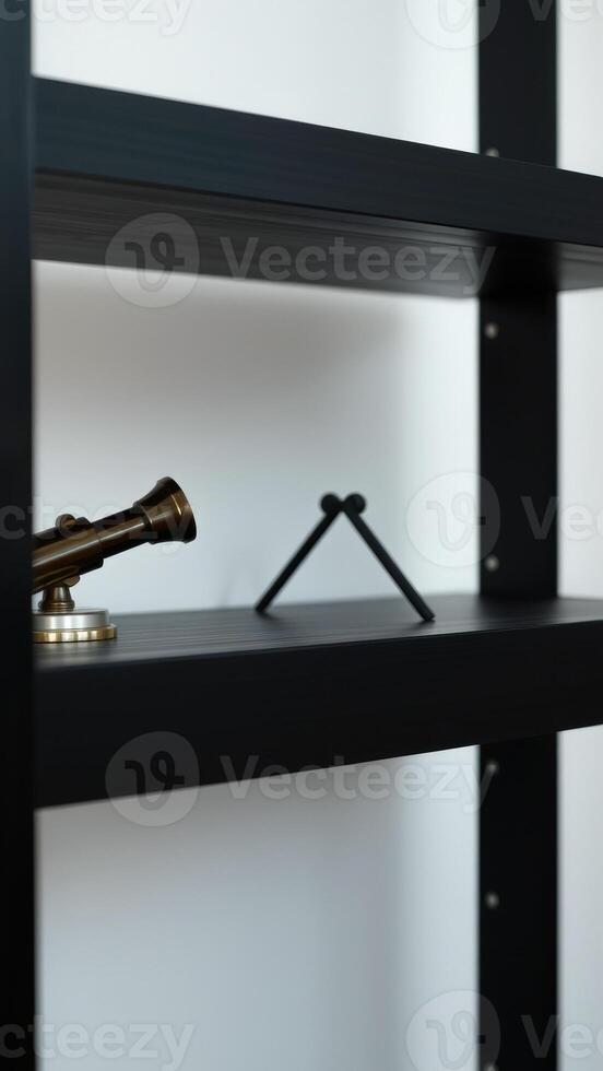 Black Shelf With Gold Telescope photo