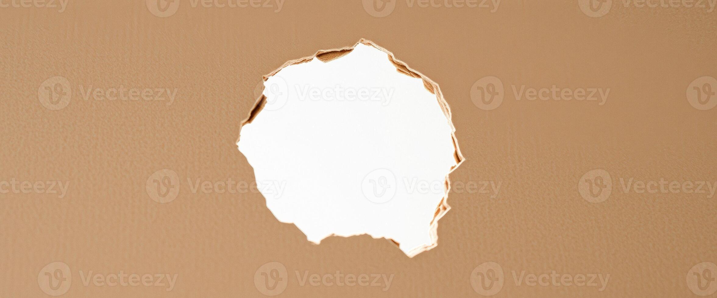 Torn Paper with Light Shining Through photo