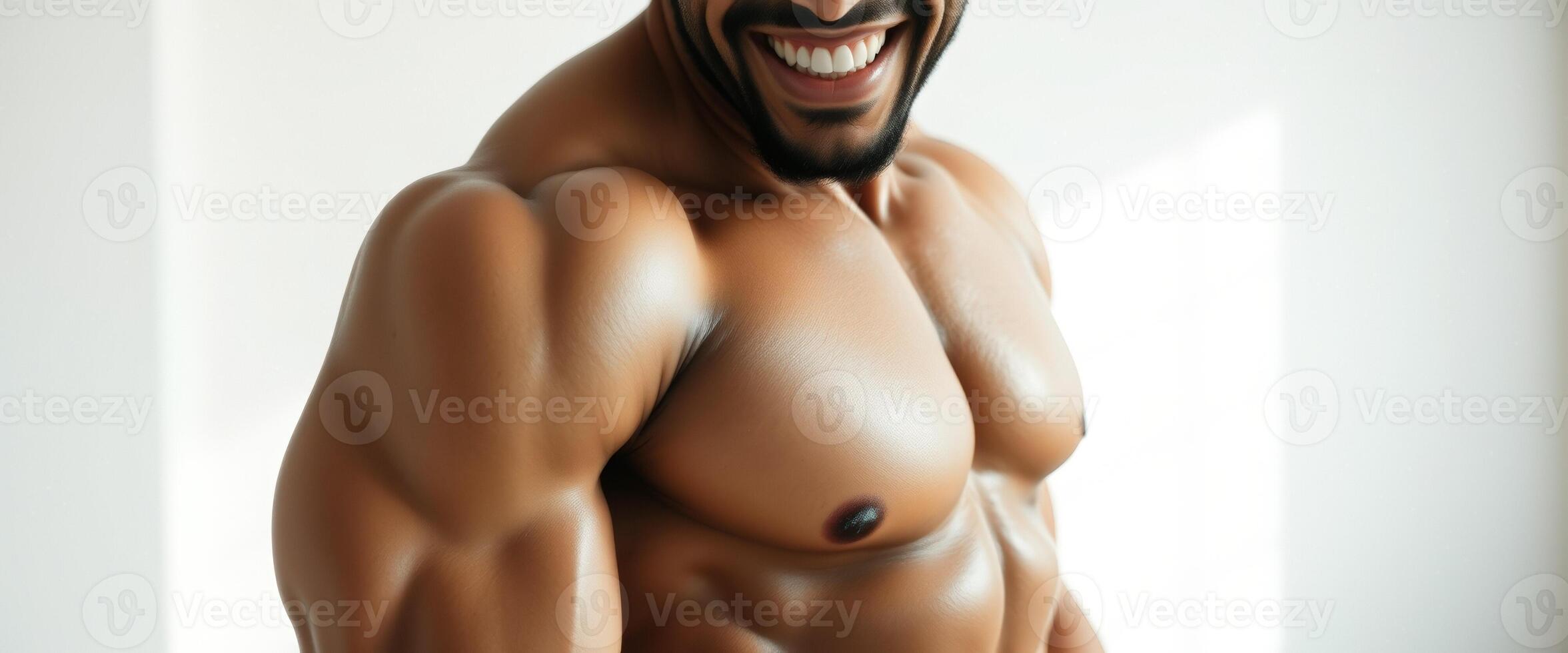 Close-up of a man's chest and shoulders with a smile photo