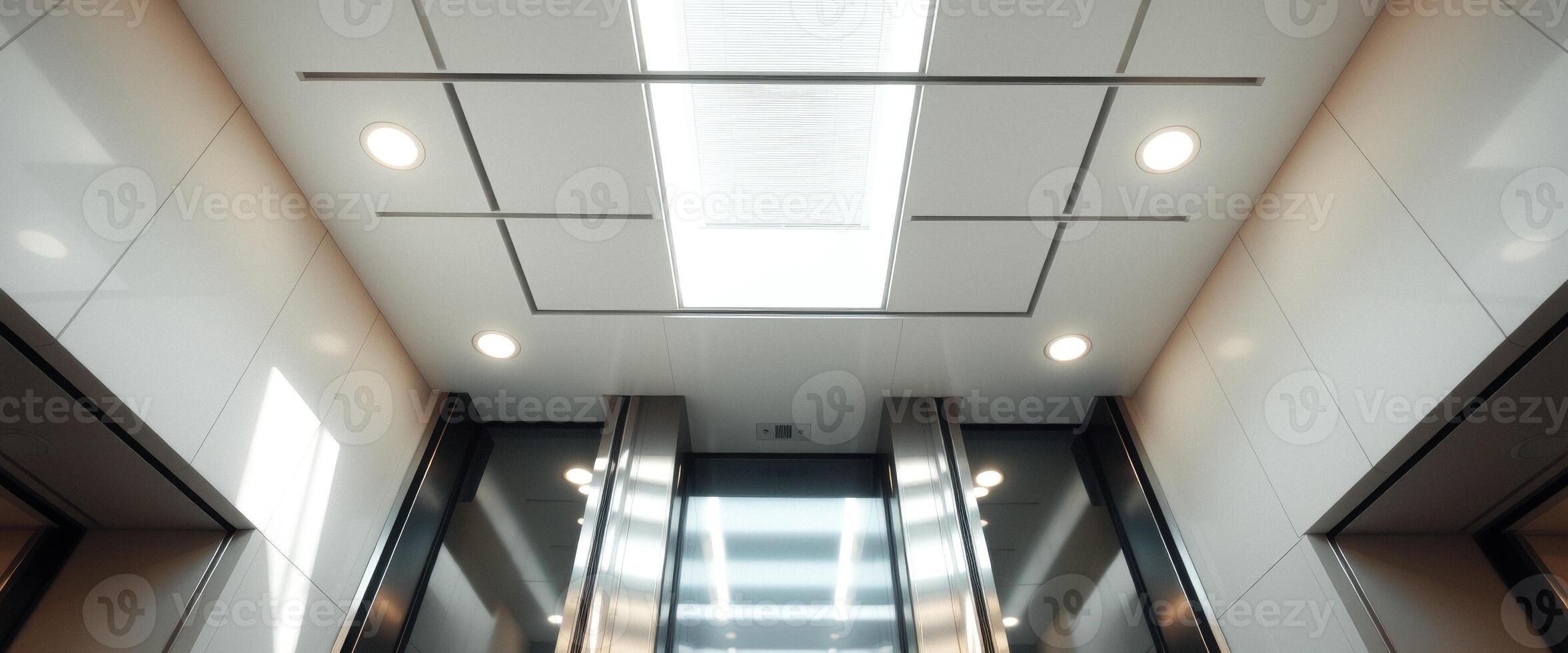 Modern elevator interior with ceiling lights photo